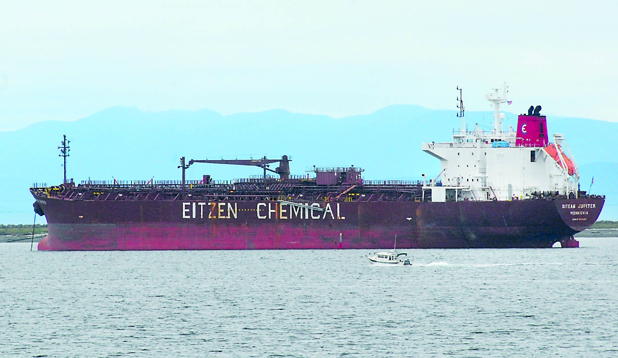 The 594-foot Siteam Jupiter rests at anchor in Port Angeles Harbor following her UWILD while moored last week.  -- Photo by Keith Thorpe/Peninsula Daily News