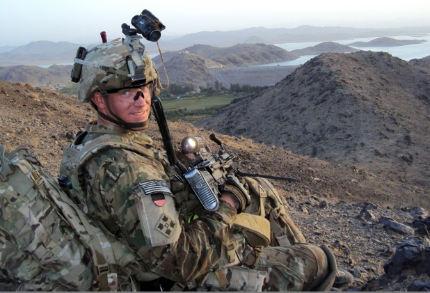 Army Staff Sgt. Ty Carter watches over a road in Afghanistan in July 2012. U.S. Army via The Associated Press