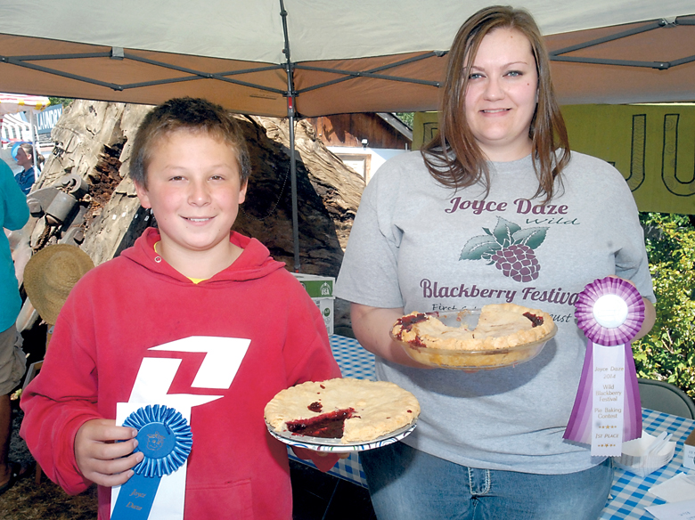 The first-place winners in the wild blackberry pie contest