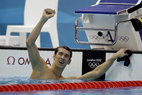 Michael Phelps won the 100-meter butterfly on Friday for the record 17th gold and 21st medal overall in his Olympic career. Above