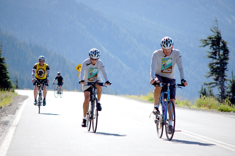 Bicyclists climb the road to Hurricane Ridge in the Olympic National Park last year. Park fees will be waived for riders in Sunday's recreational "Ride the Hurricane" event. Russ Veenema