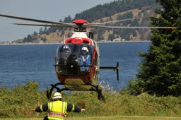 A medical helicopter from Airlift Northwest lands at Fort Discovery at Security Services Northwest's "Unity of Effort" celebration in 2012. Security Services Northwest