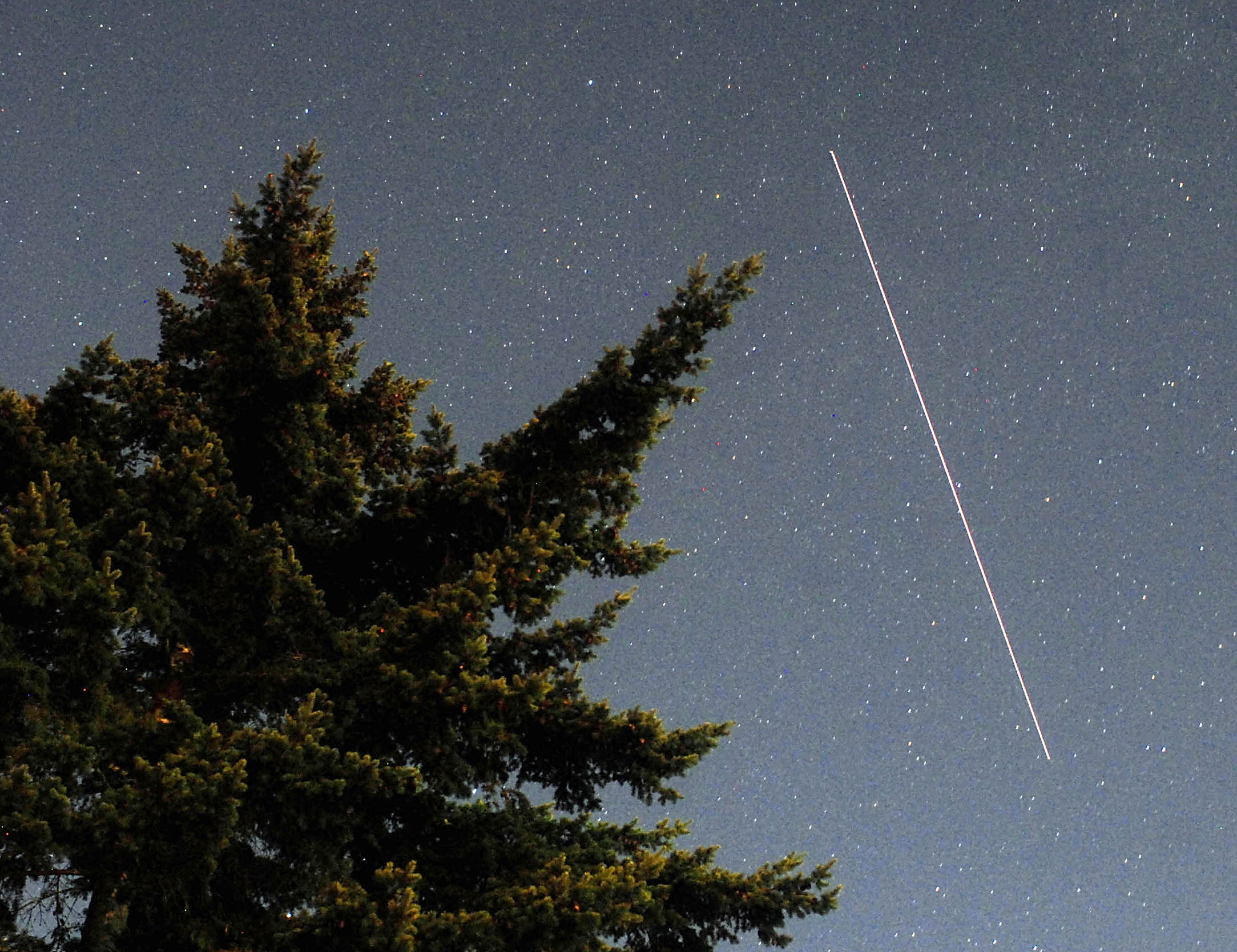 PDN photographer Keith Thorpe took this photo of a recent pass by the International Space Station.  He snapped it from the front lawn of the Olympic National Park Visitor Center in Port Angeles. Exposure was 30 seconds.