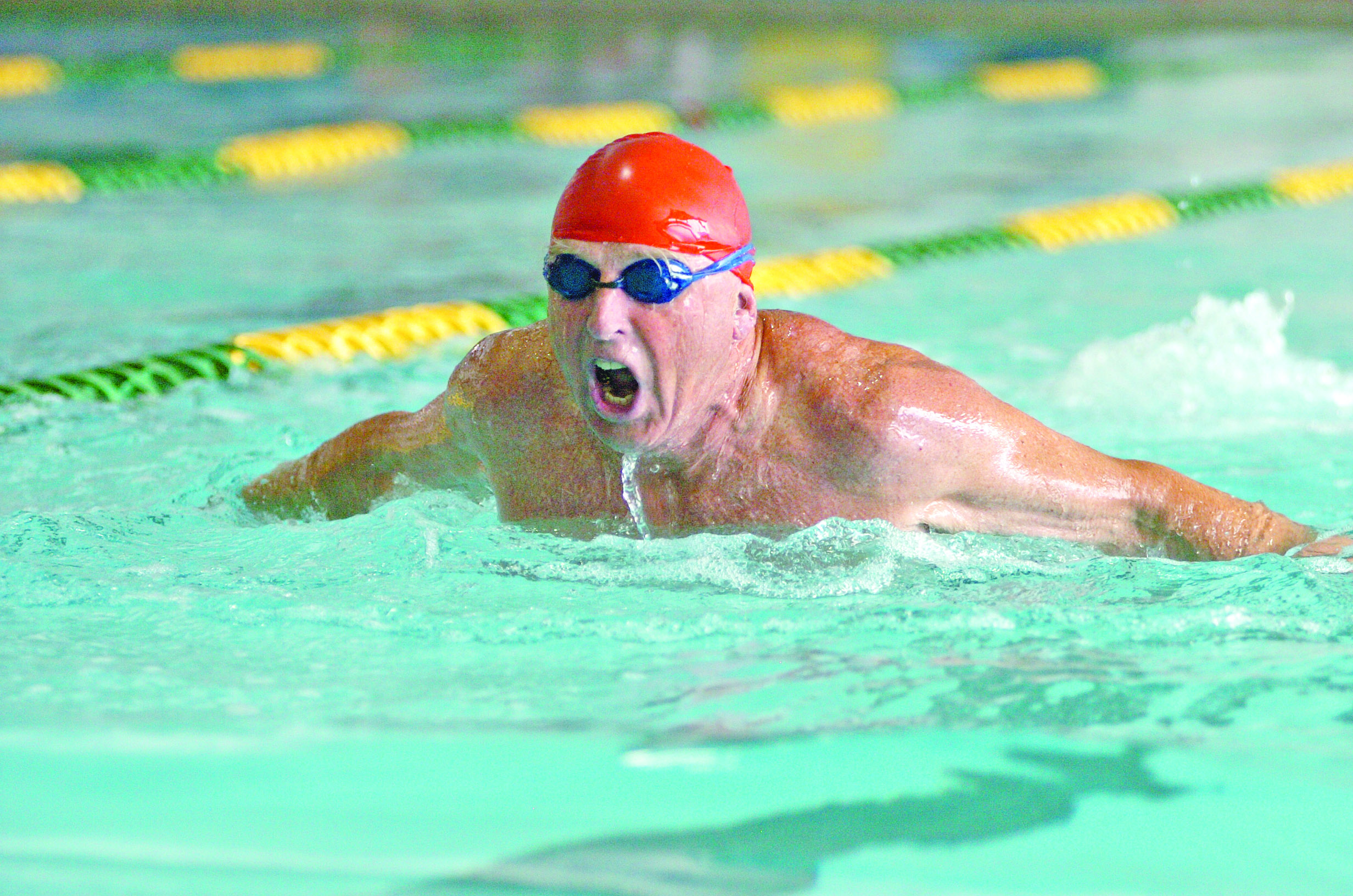 Jack Fritz of Edmonds swims the butterfly at the William Shore Memorial Pool during the 2010 Olympic Peninsula Senior Games. Peninsula Daily News