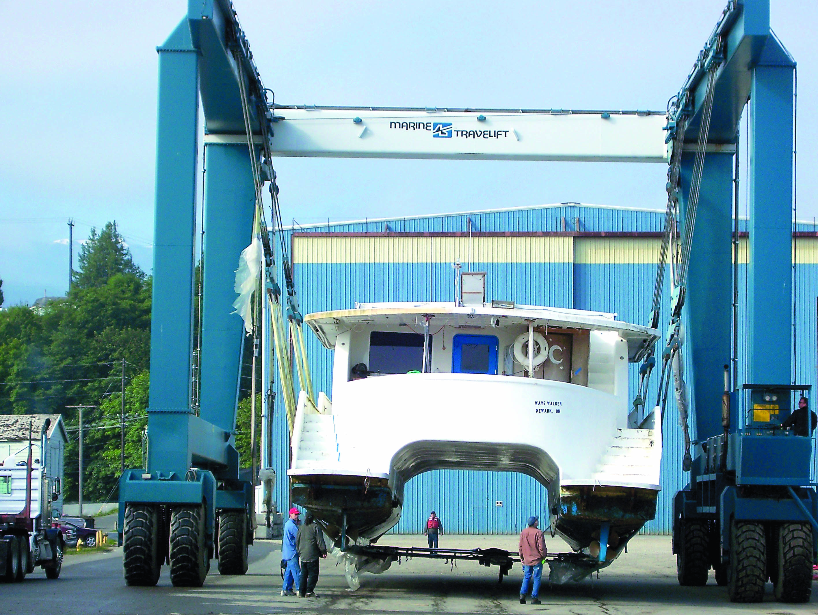 The 70-foot catamaran Wave Walker sits in the slings at Platypus Marine Inc. in Port Angeles.  -- Photo by David G. Sellars/for Peninsula Daily News