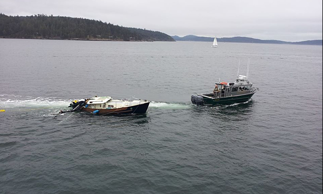 Sailboat after the collision with the state ferry Hyak. The 25-foot sailboat later sank. KOMO-TV
