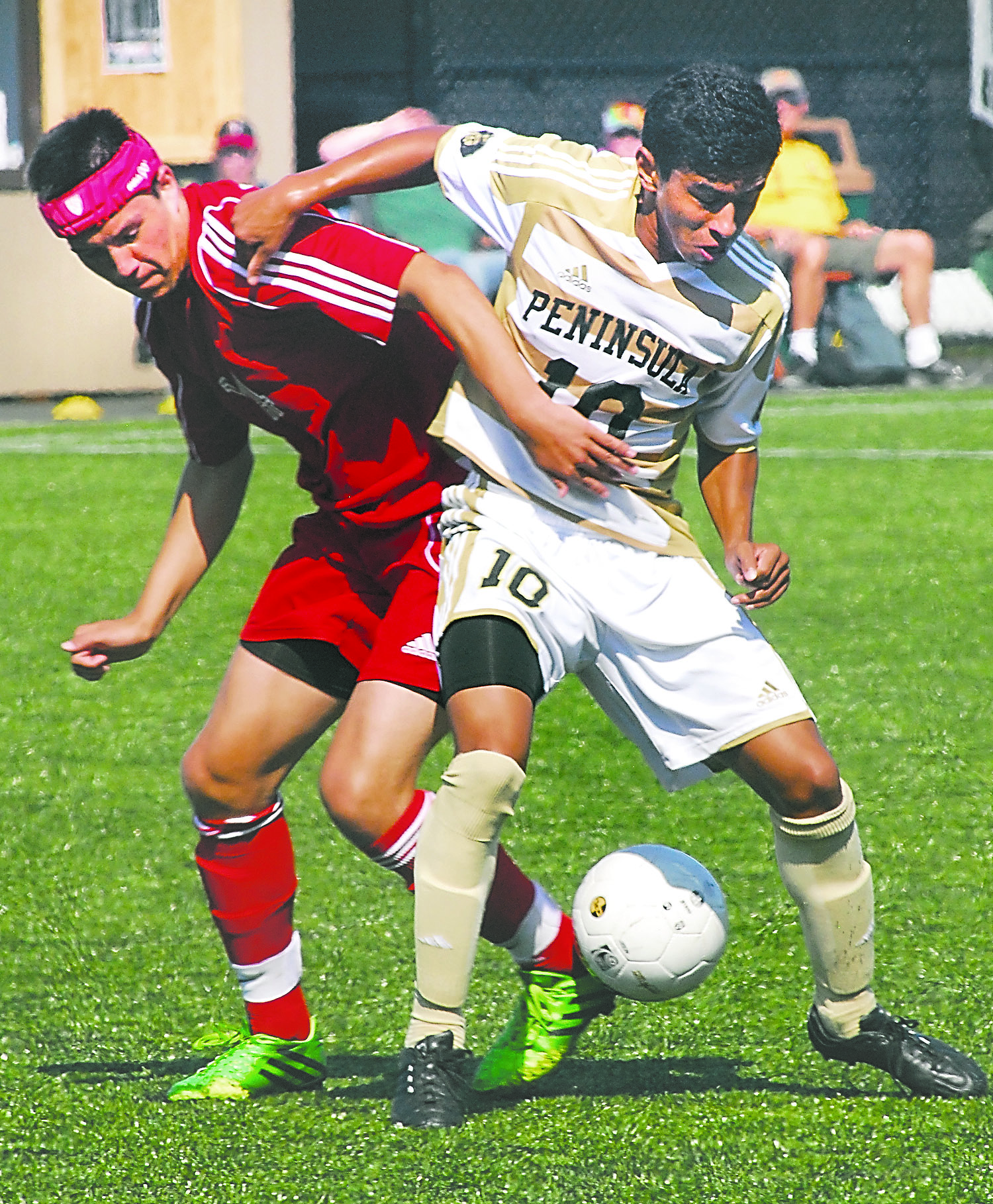 Peninsula College's Erick Urzua battles Southwestern Oregon's Zachary Barker for the ball during the Pirates' 4-0 win at Wally Sigmar Field. Keith Thorpe/Peninsula Daily News