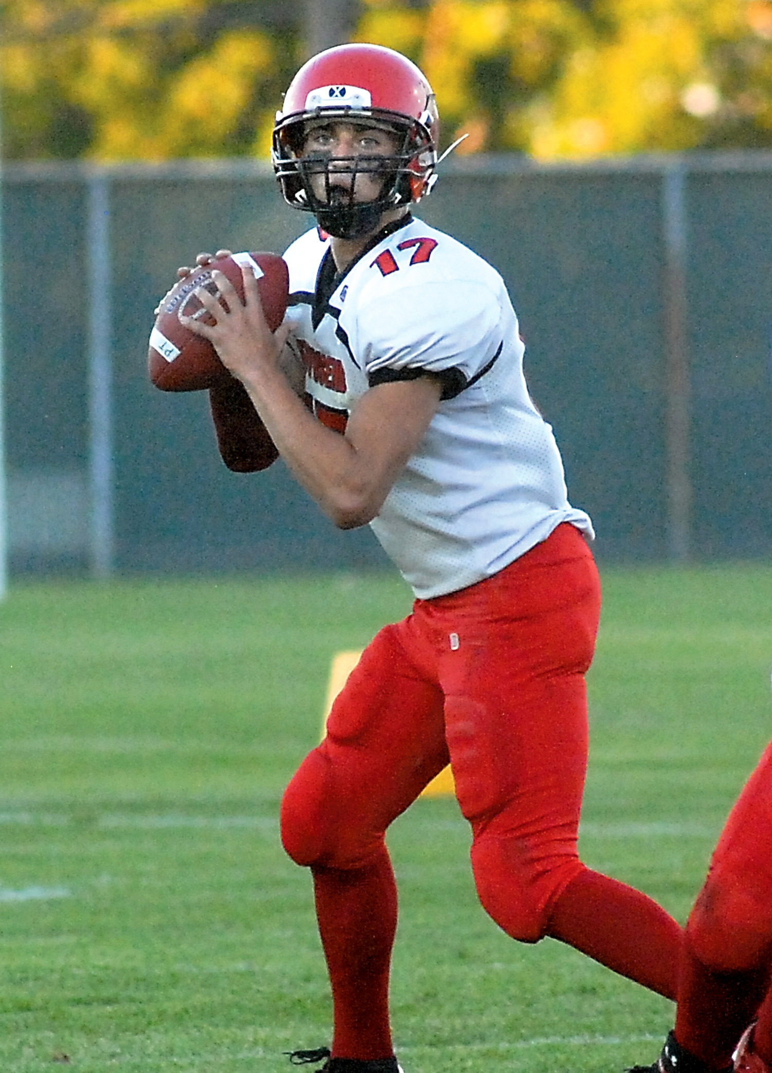 Port Townsend quarterback Jeff Seton looks to pass against Port Angeles earlier this month. Seton and the Redhawks face Olympic League 1A Division foe Klahowya tonight at Memorial Field. Keith Thorpe/Peninsula Daily News