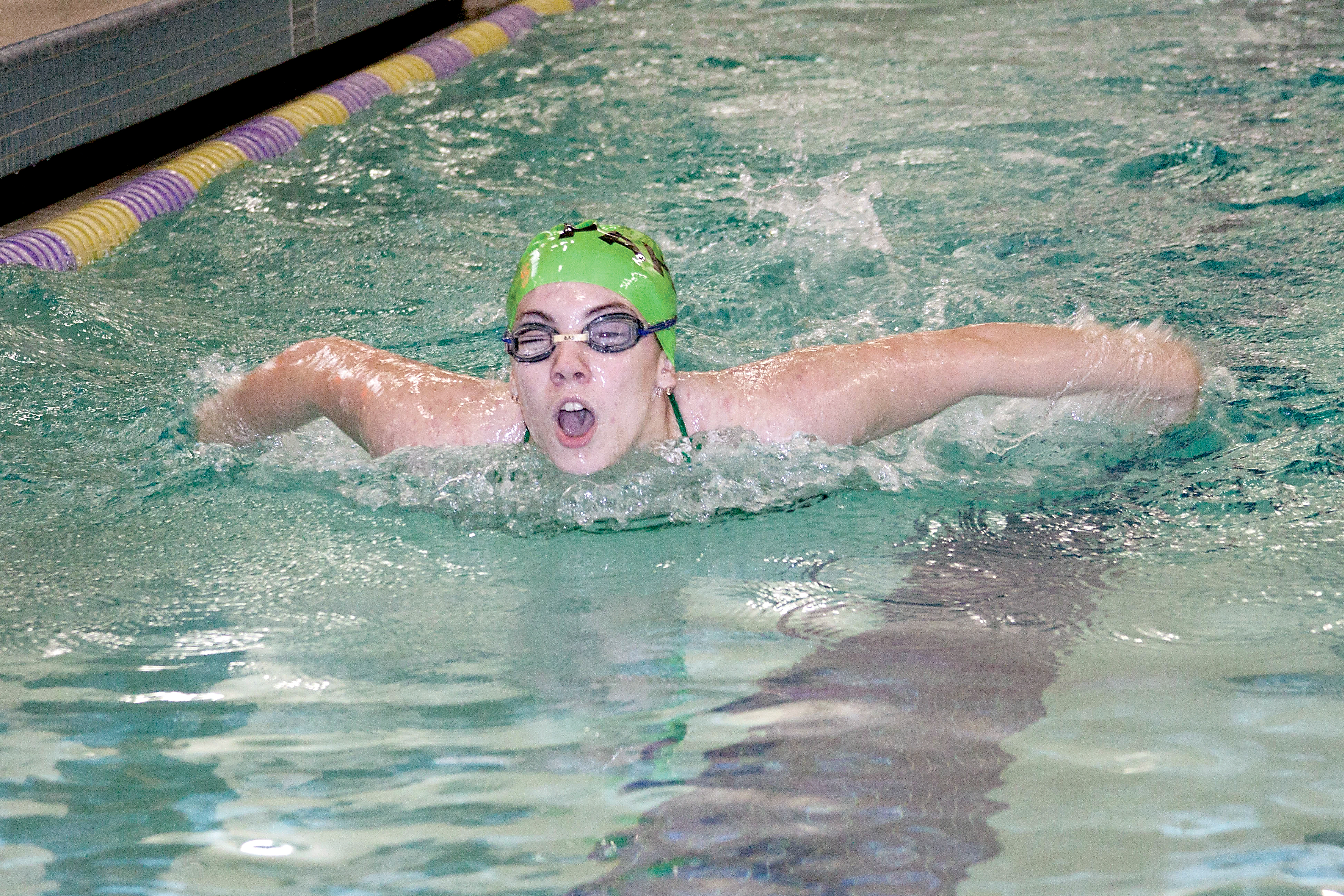 Port Angeles' Jayden Sparhawk swims in the 100-freestyle against Kingston. Patty Reifenstahl