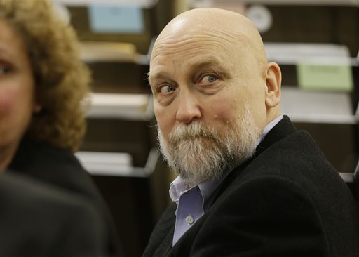 Darold Stenson glances around the courtroom during the first day of testimony in his retrial Monday. Ted S. Warren/The Associated Press