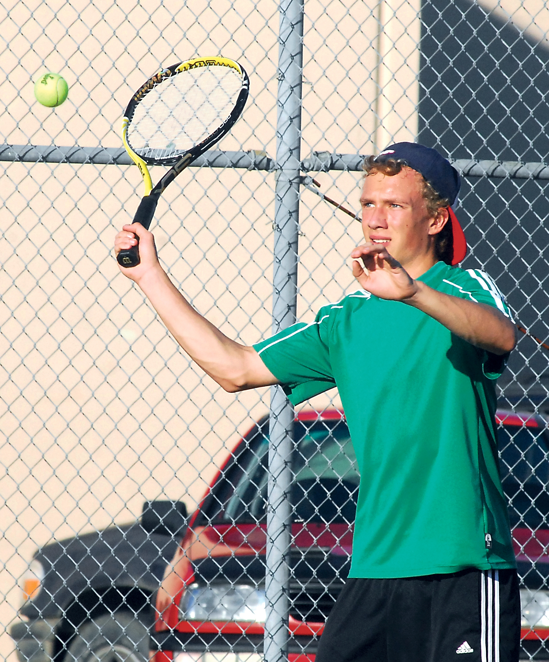 Port Angeles' Nick Fritschler plays against Sequim's Victor Lam in the No. 1 singles match. Keith Thorpe/Peninsula Daily News