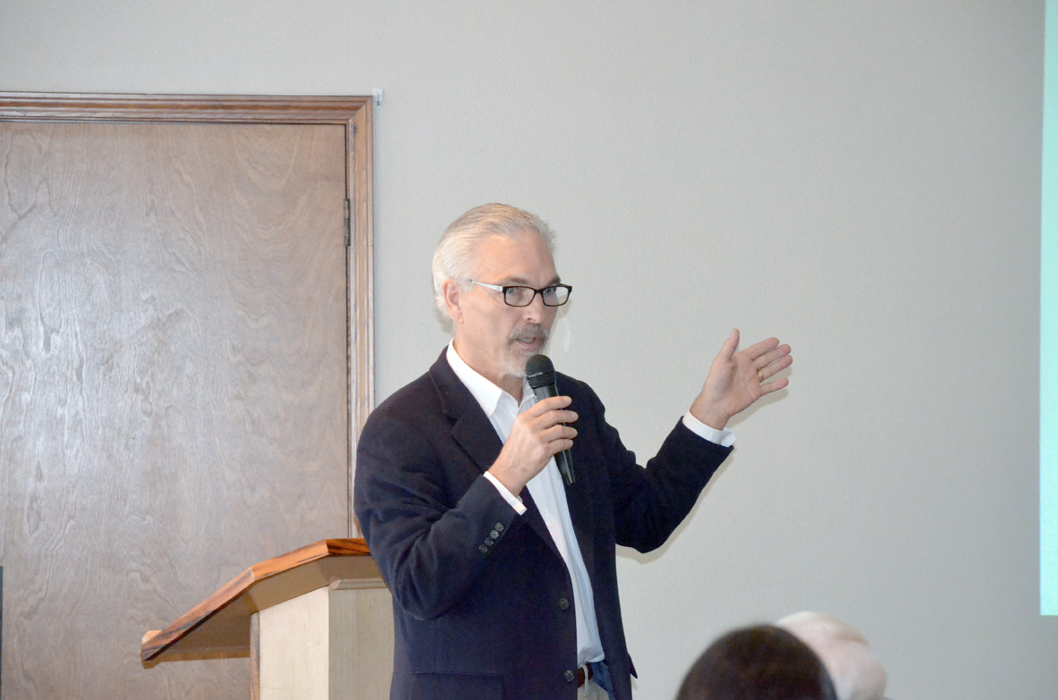 Port Townsend School District Superintendent David Engle addresses the Jefferson County Chamber of Commerce on Monday about a proposed maritime academy. Charlie Bermant/Peninsula Daily News