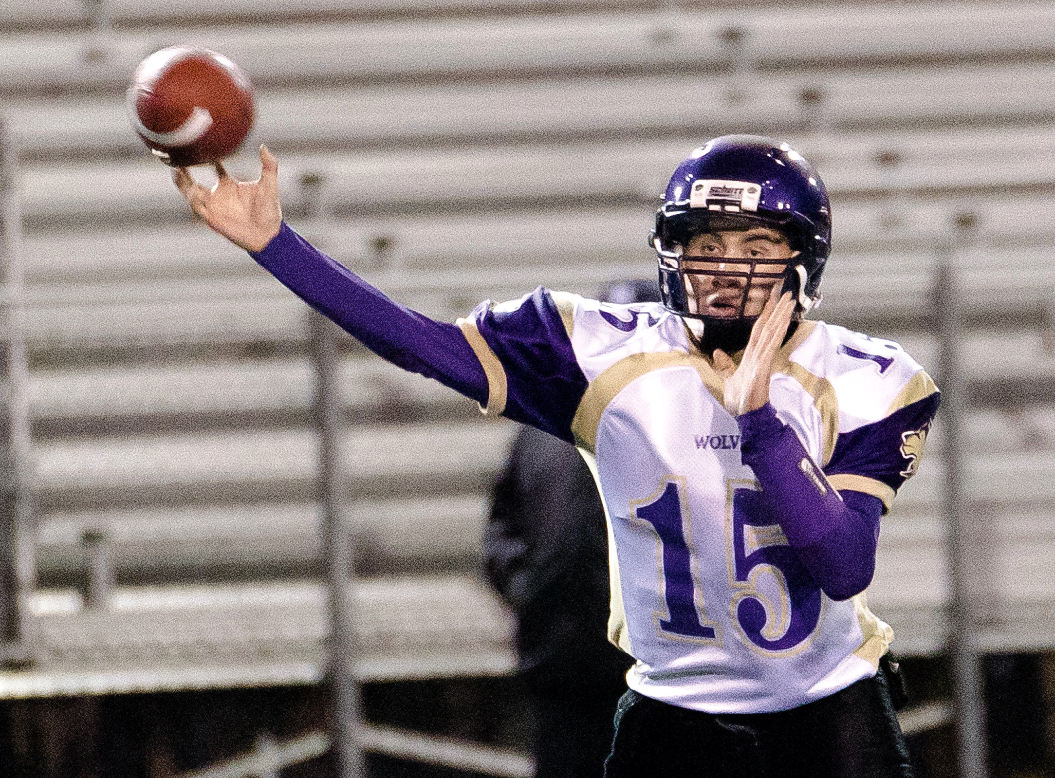 Sequim quarterback Miguel Moroles throws a pass against Foster. Moroles