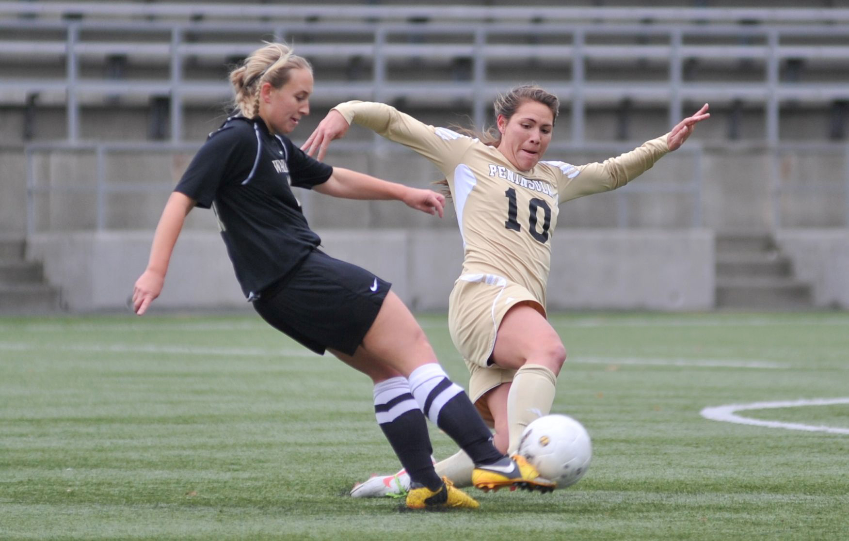 Peninsula College forward Bri Afoa battles for the ball during the Pirates' 2-0 win  over Walla Walla in the NWAAACC semifinals Saturday. Jeff Halstead/for Peninsula Daily News
