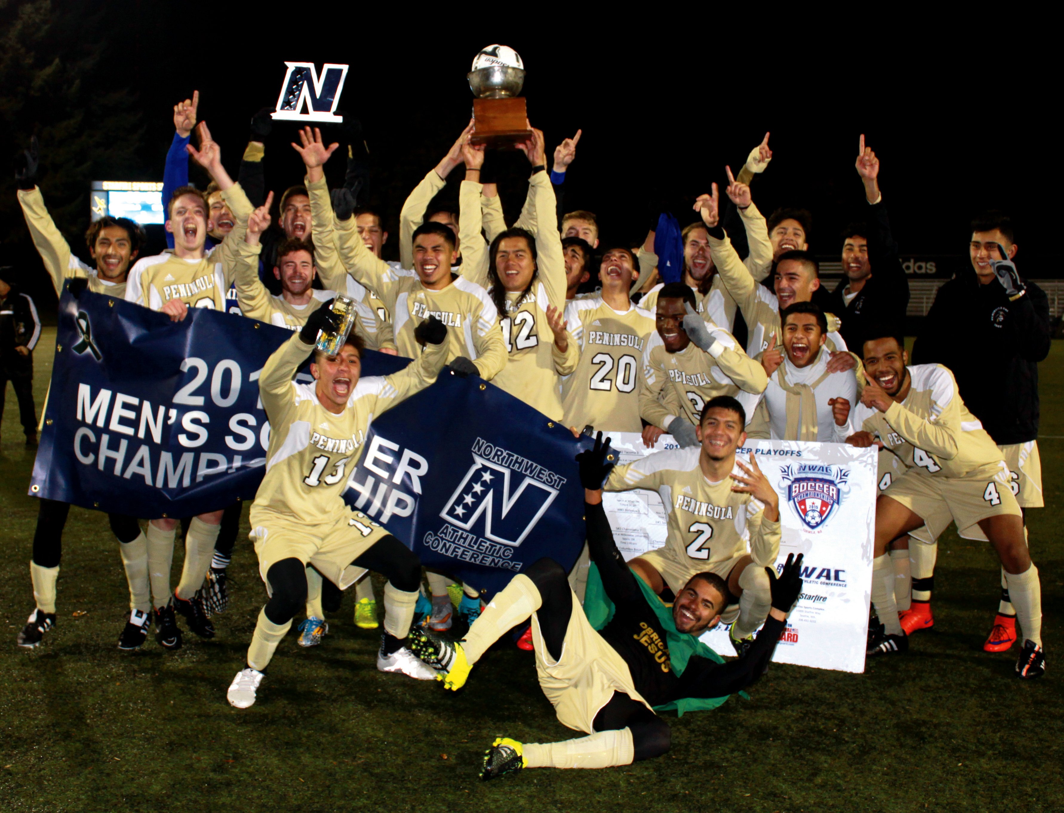 The Peninsula College men's soccer team celebrates after winning the NWAC championship with a 4-3 win over Spokane at Starfire Sports Complex in Tukwila. Jose Soto (2) scored the winning goal in the 85th minute. Rick Harrison/for NWAC