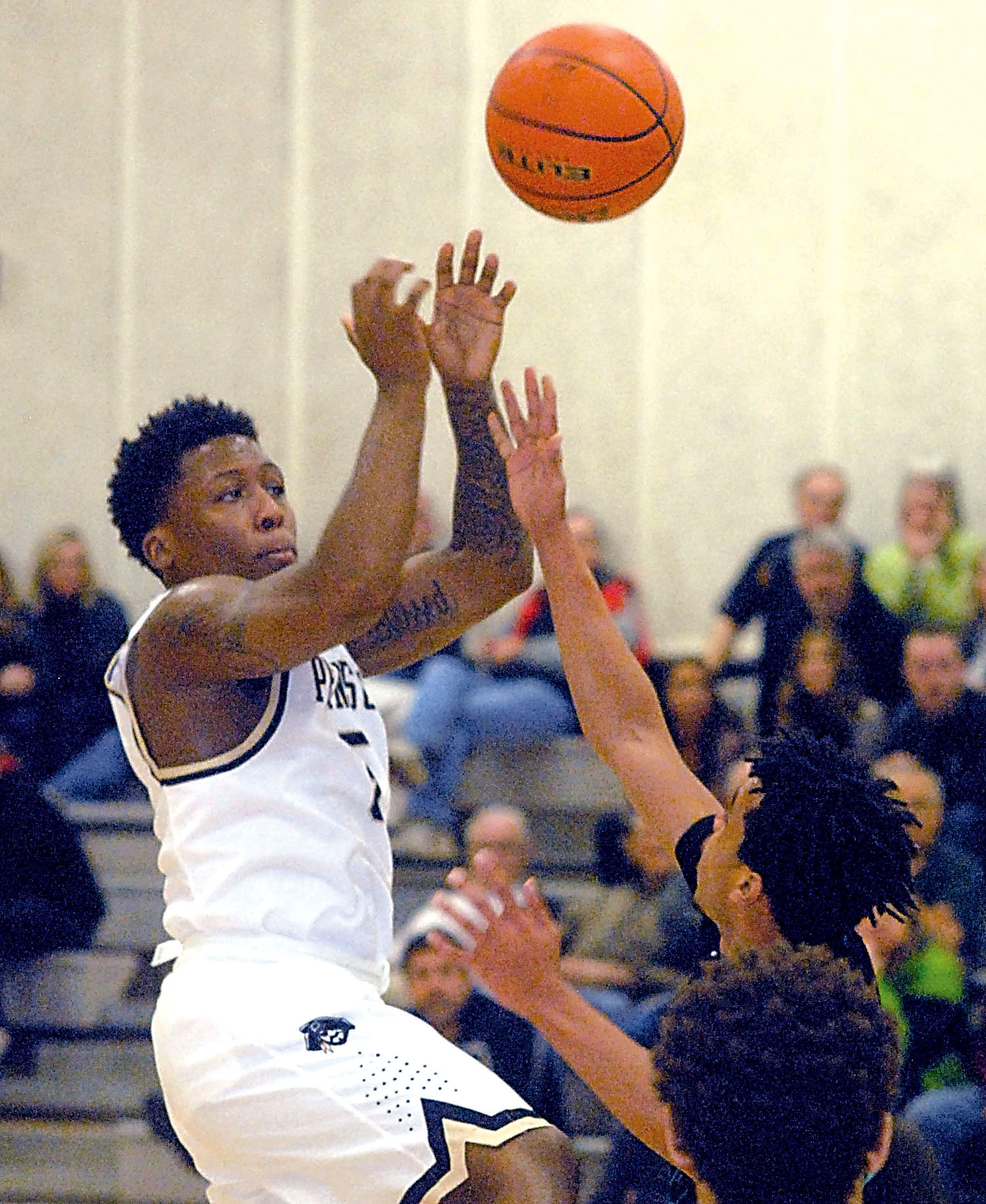 Peninsula's Darrion Daniels shoots over Highline's Coby Myles during their Nov. 21 matchup in Port Angeles. Daniels and the Pirates host the First Federal Pirate Classic on Saturday and Sunday. Keith Thorpe/Peninsula Daily News