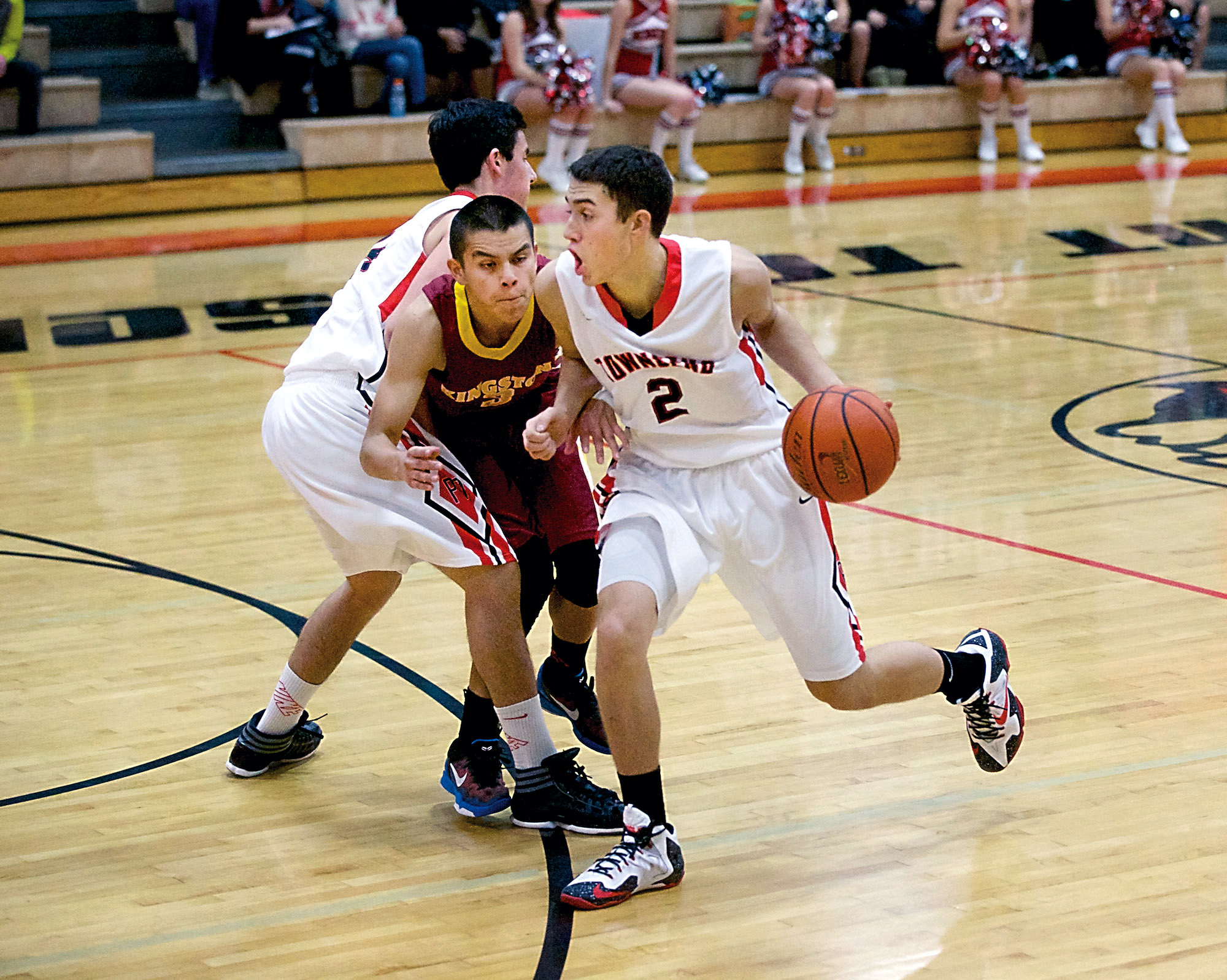 Port Townsend guard Cody Russell (2) uses a screen from teammate James Delagarza