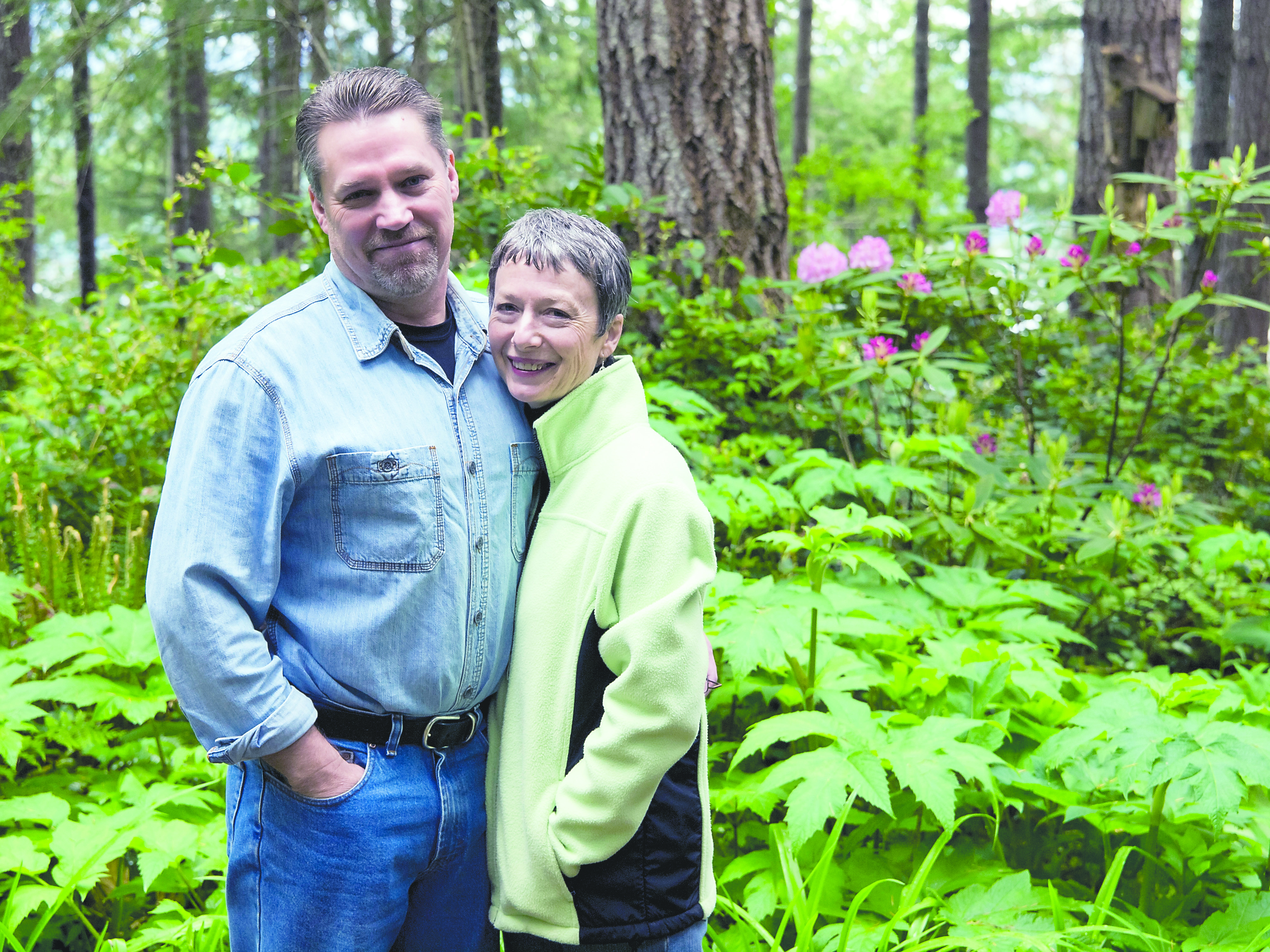 Keith Lazelle and Jane Hall are pictured at their property and residence on Dabob Bay