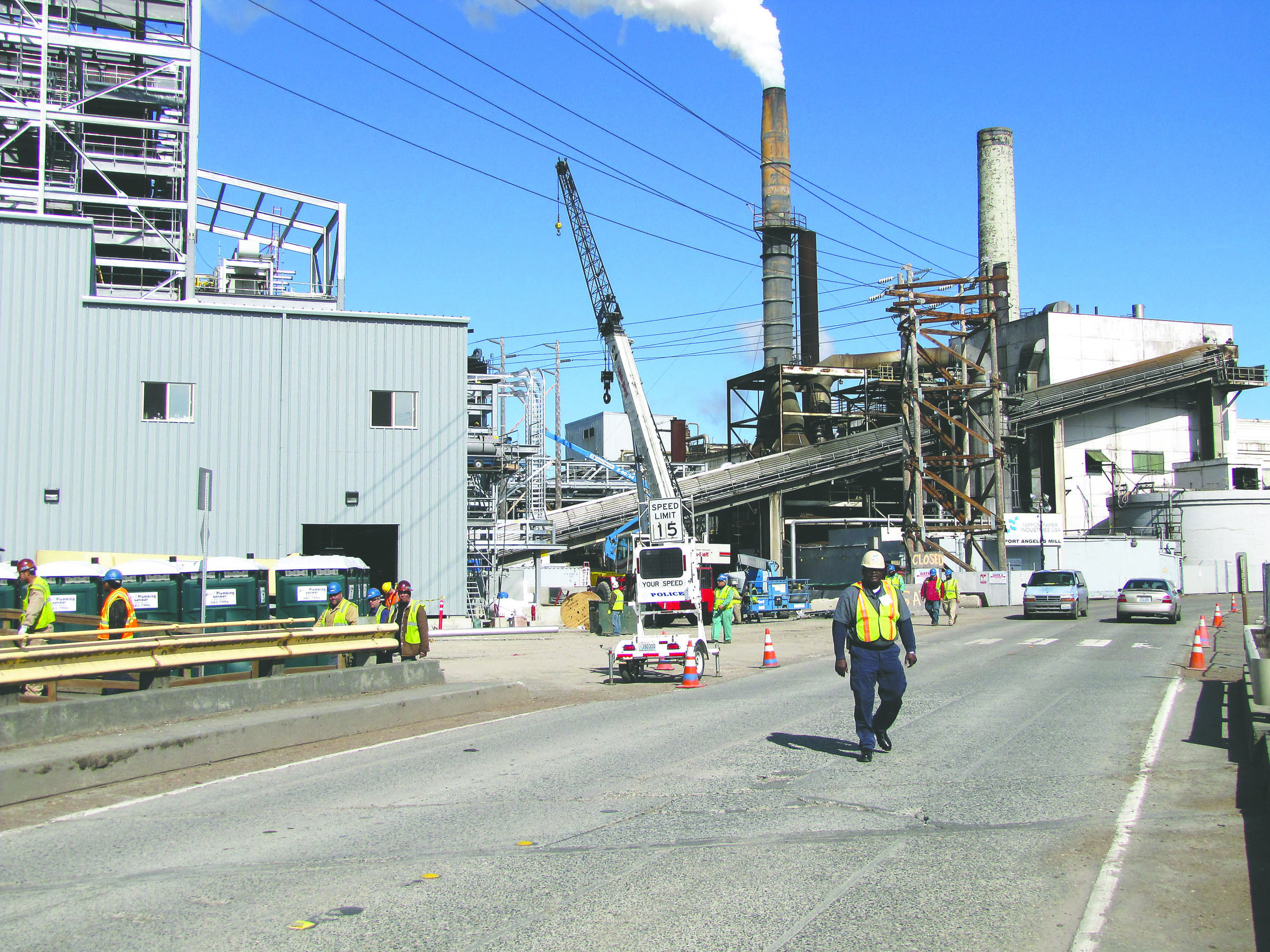 Workers at the Nippon Paper Industries USA mill in Port Angeles start their lunch period Monday