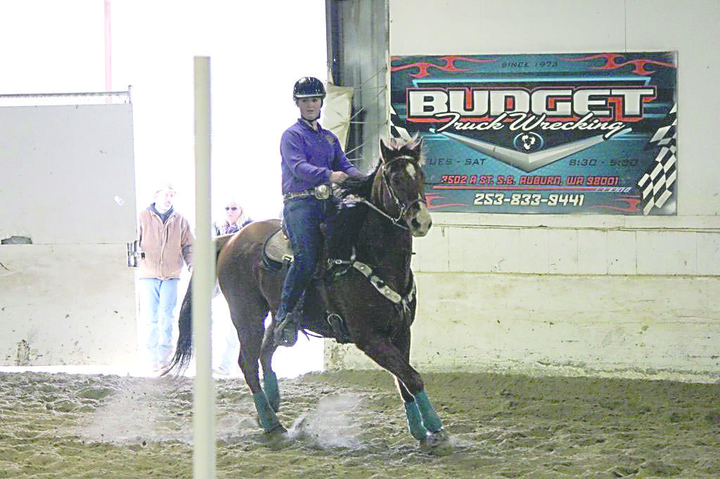 Tylar Decker of the Sequim High School equestrian team set a new Washington High School Equestrian Team district record for individual flags with a time of 8.71 seconds. The next WAHSET meet will be Thursday
