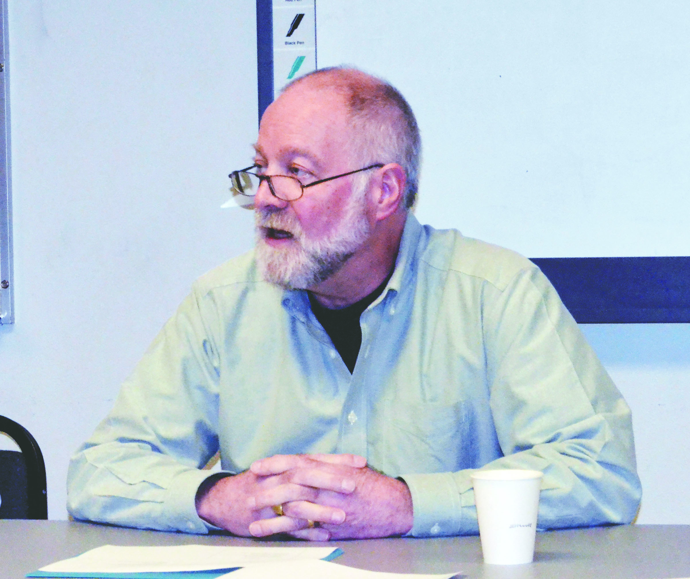 Peter Quinn addresses county commissioners on Monday. Photo by Charlie Bermant/Peninsula Daily News