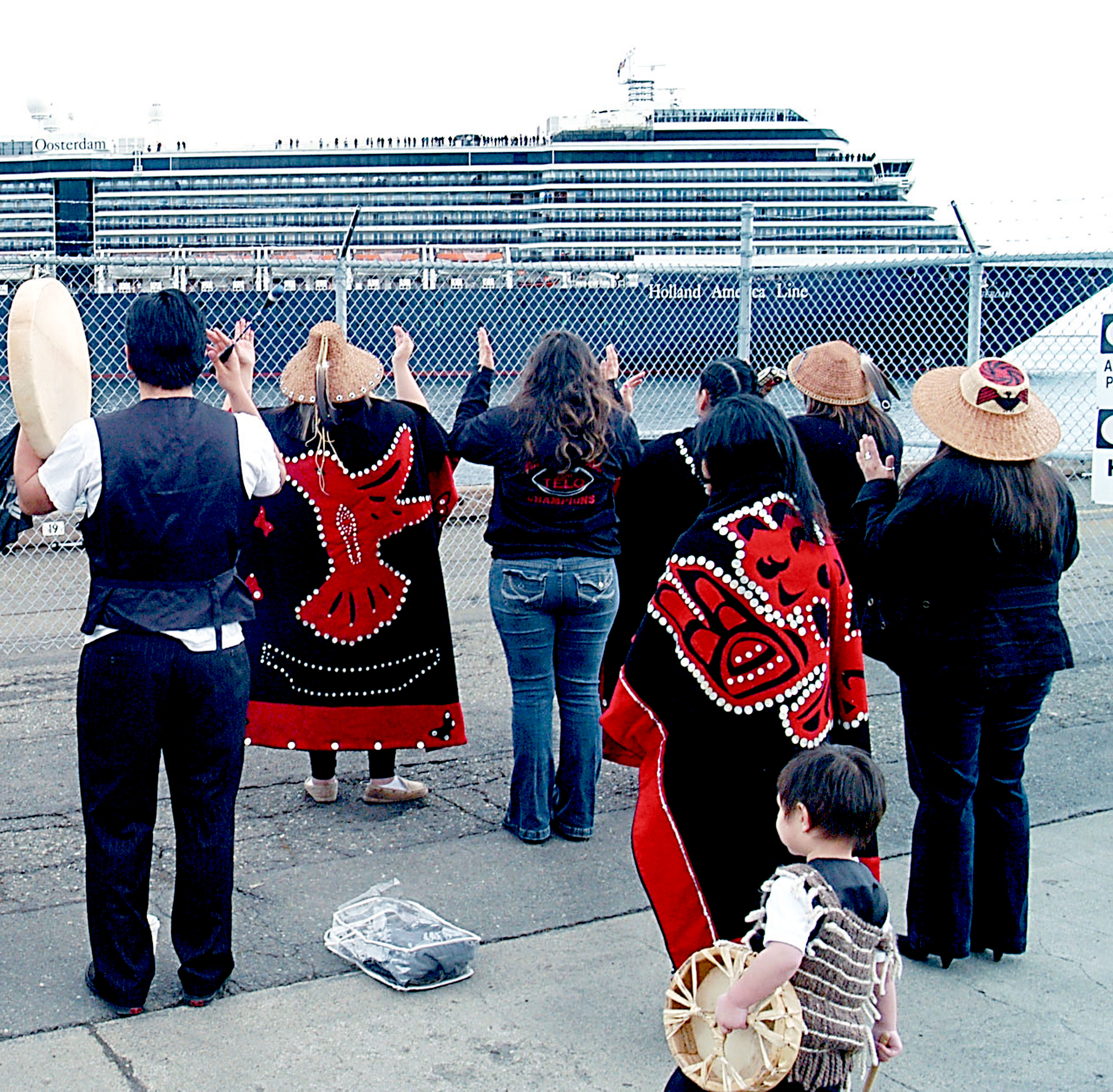 Lower Elwha Klallam tribal members welcome the ms Oosterdam when the 950-foot cruise ship visited Port Angeles in 2012. The liner makes a return visit May 9.  —Photo by Keith Thorpe/Peninsula Daily News