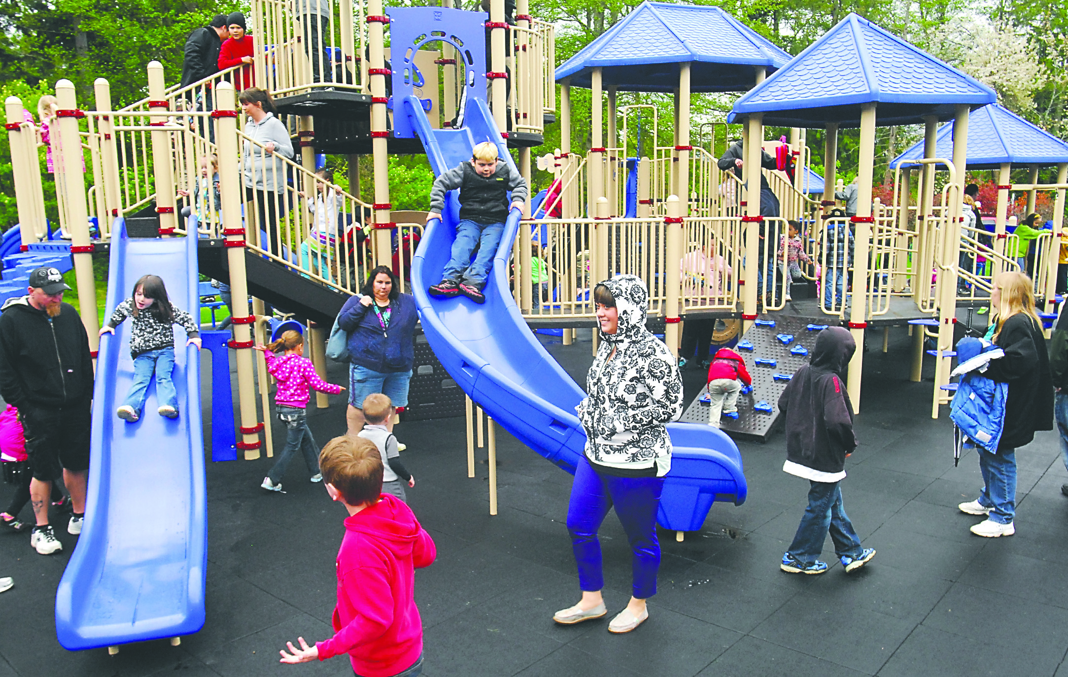The scene at Saturdays grand opening of the Shane Park playground in Port Angeles.  -- Photo by Keith Thorpe/Peninsula Daily News
