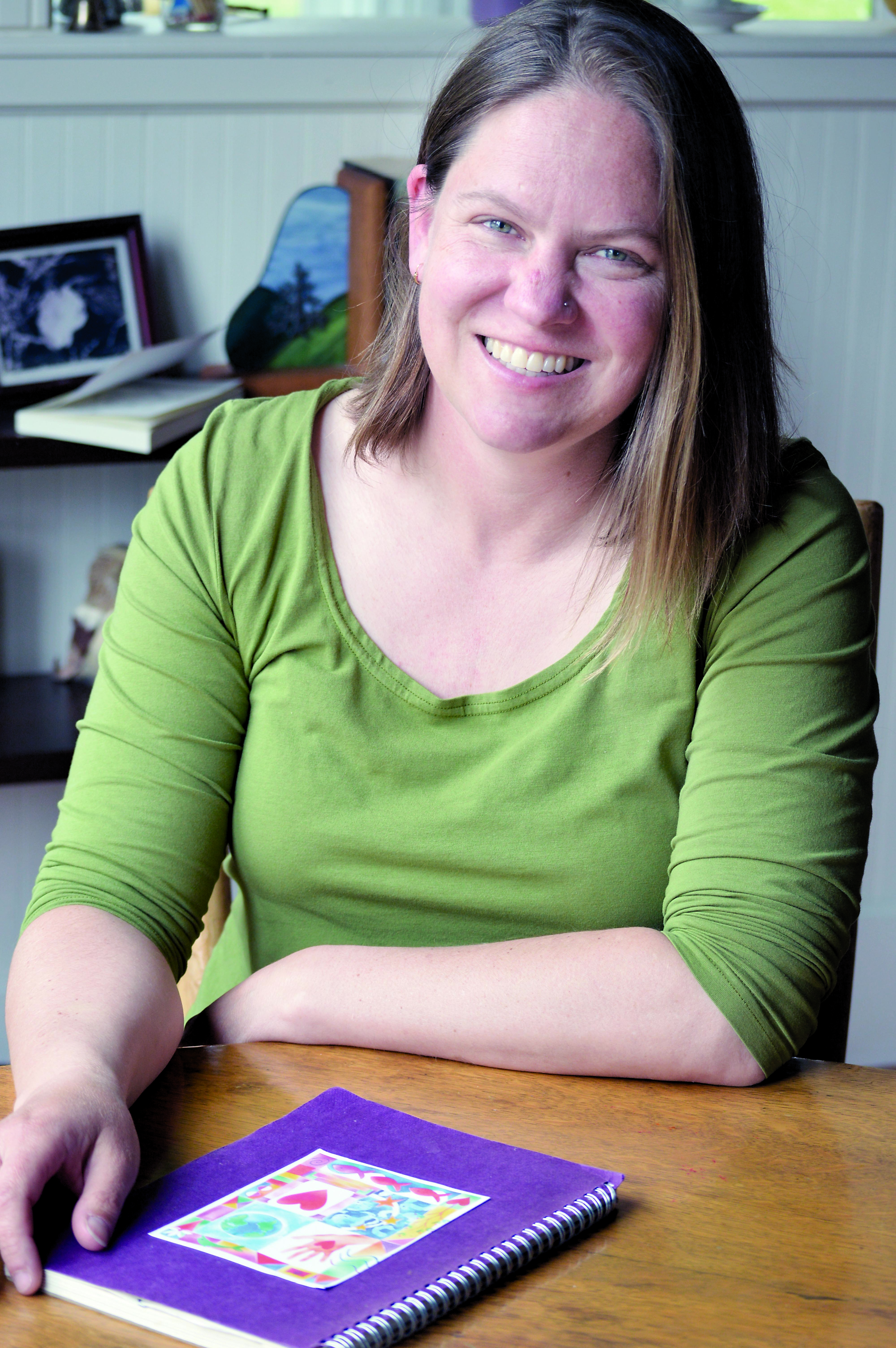 Carrie Sanford of Port Angeles keeps a house journal called the Heart Book.  —Photo by Diane Urbani de la Paz/Peninsula Daily News