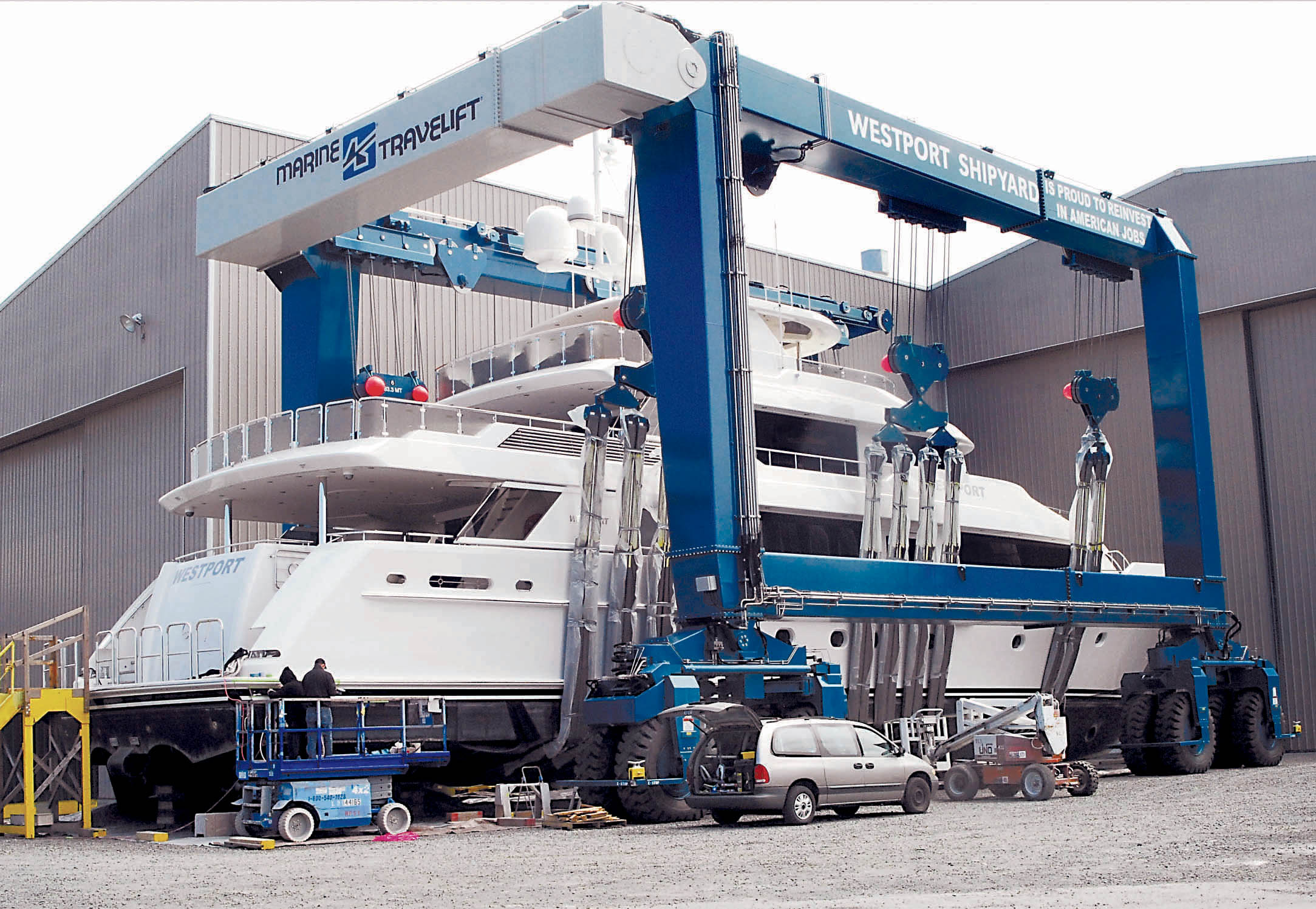 A new 164-foot Westport yacht sits in the slings of a TraveLift outside the company’s factory in Port Angeles in 2012. Westport Shipyard has been sold to a Louisiana-based company.  —Photo by Keith Thorpe/Peninsula Daily News