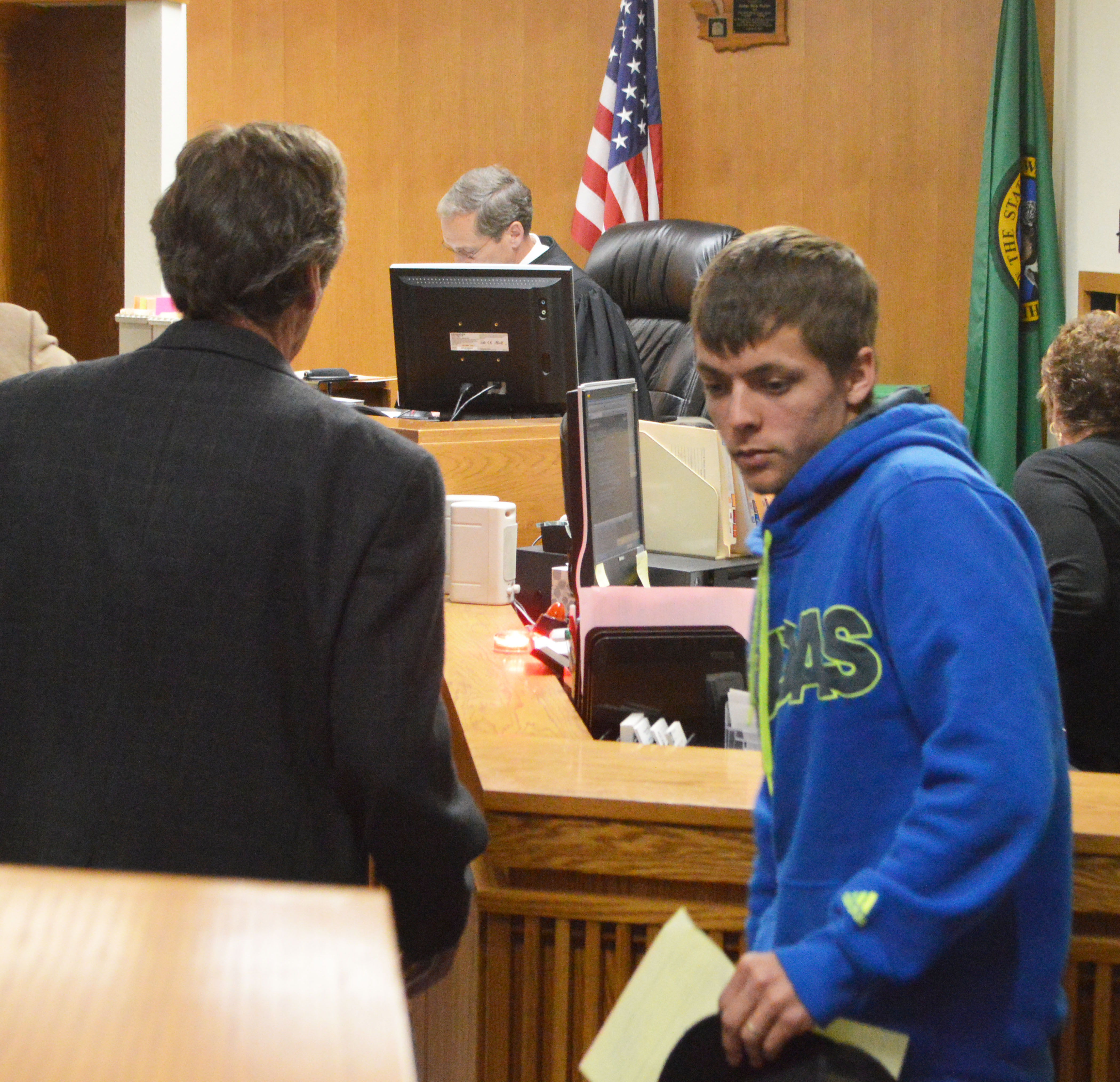 Jason Holden leaves the Clalllam County District Court bench Thursday after being charged with disorderly conduct for a staged kidnapping April 13 in Sequim’s Carrie Blake Park.  — Photo by Joe Smillie/Peninsula Daily News