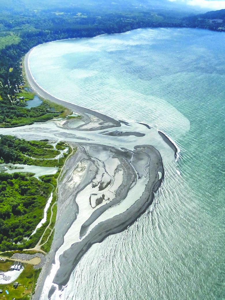 The mouth of the Elwha River and Freshwater Bay are pictured in this aerial photo taken June 8 by Tom Roorda for the Coastal Watershed Institute. Copyright &Copy; 2014