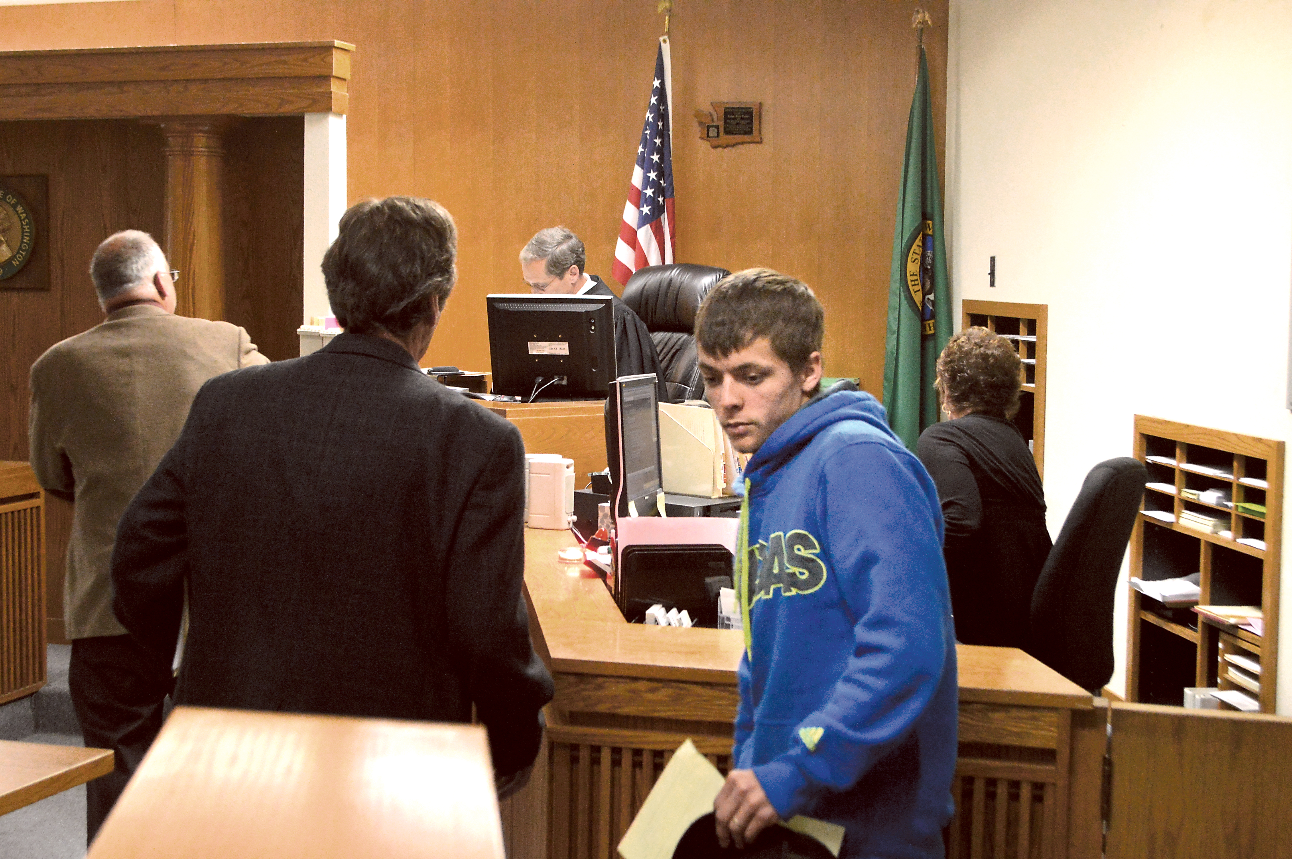 Jason Holden leaves the Clallam County District Court bench Thursday after being charged with disorderly conduct for a staged kidnapping on April 13 in Sequim's Carrie Blake Park. Joe Smillie/Peninsula Daily News