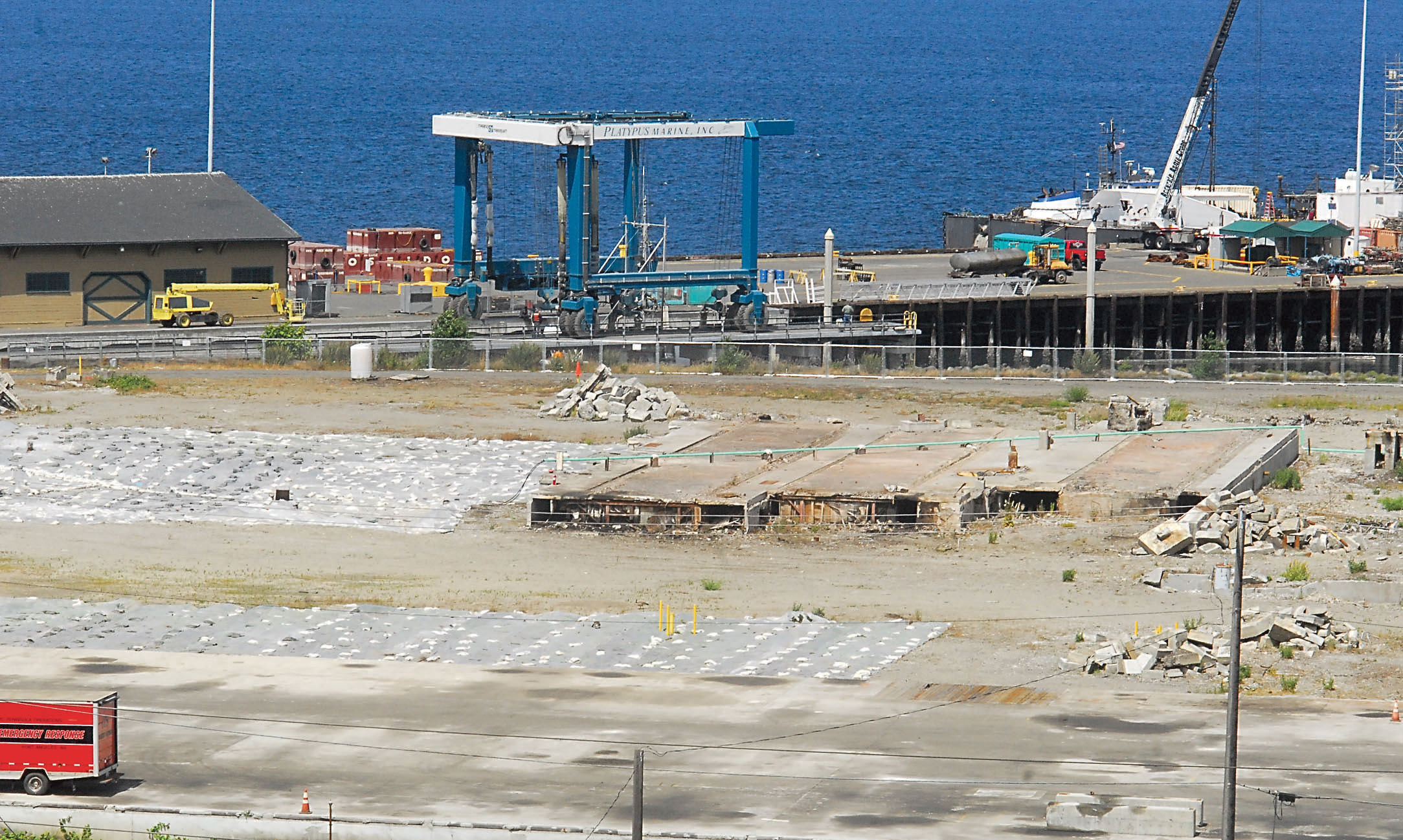 All that’s left of the former Peninsula Plywood mill on the Port Angeles waterfront are concrete foundations