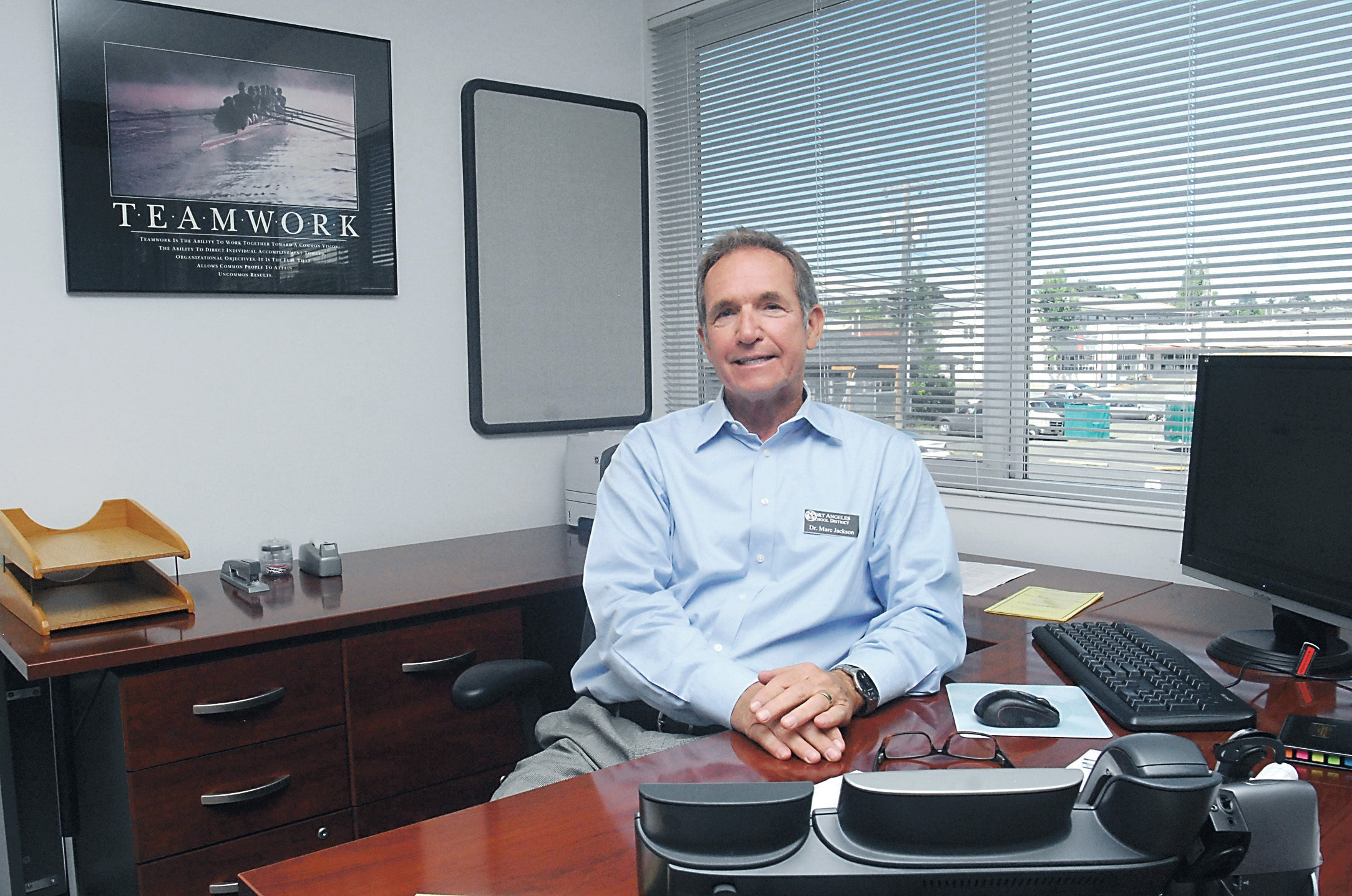 Marc Jackson pauses in his new office at Port Angeles School District headquarters. Photo by Keith Thorpe/Peninsula Daily News