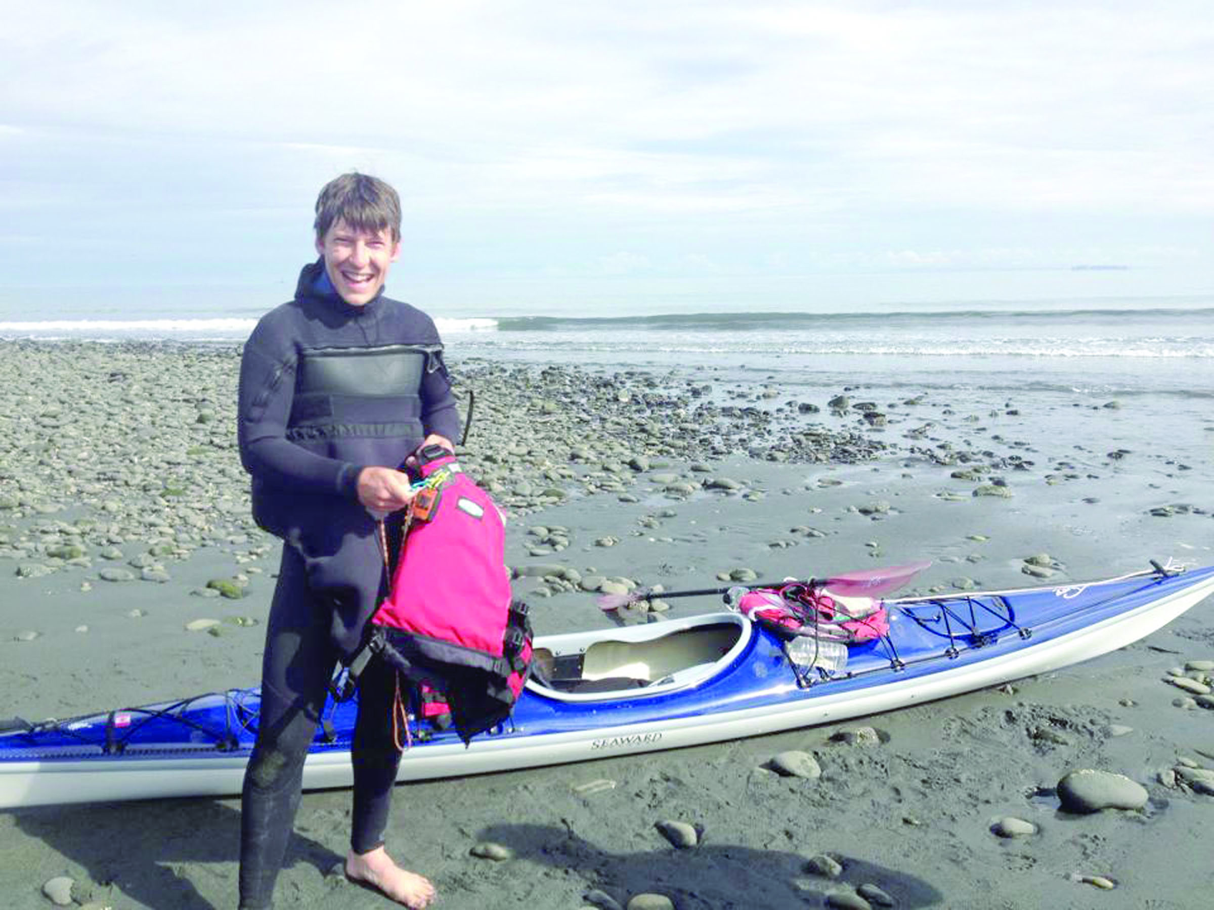 Zach Brown prepares to depart Sunday from a beach near Port Angeles for the second leg of his 2