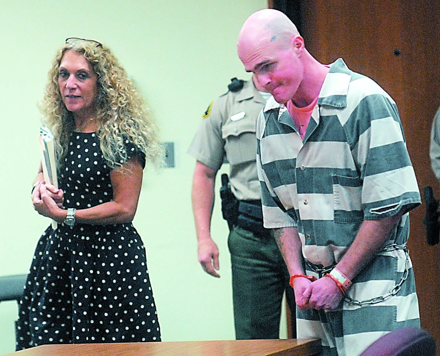 Richard Drum enters Clallam County Superior Court with court-appointed attorney Karen Unger on Friday. Drum
