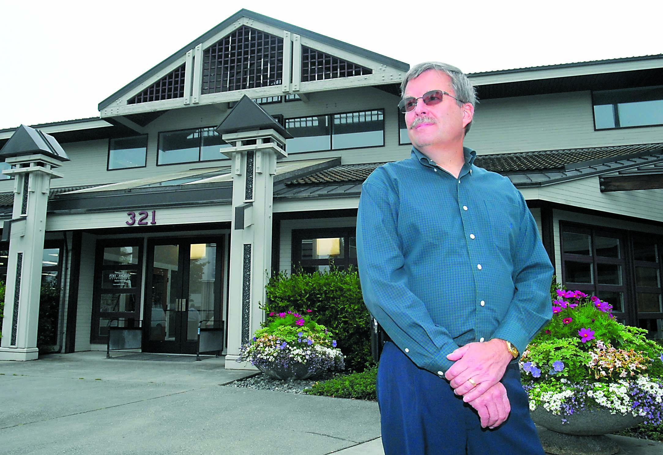 Dan McKeen stands outside of Port Angeles City Hall after his selection by the City Council for the post of permanent city manager Friday. Keith Thorpe/Peninsula Daily News