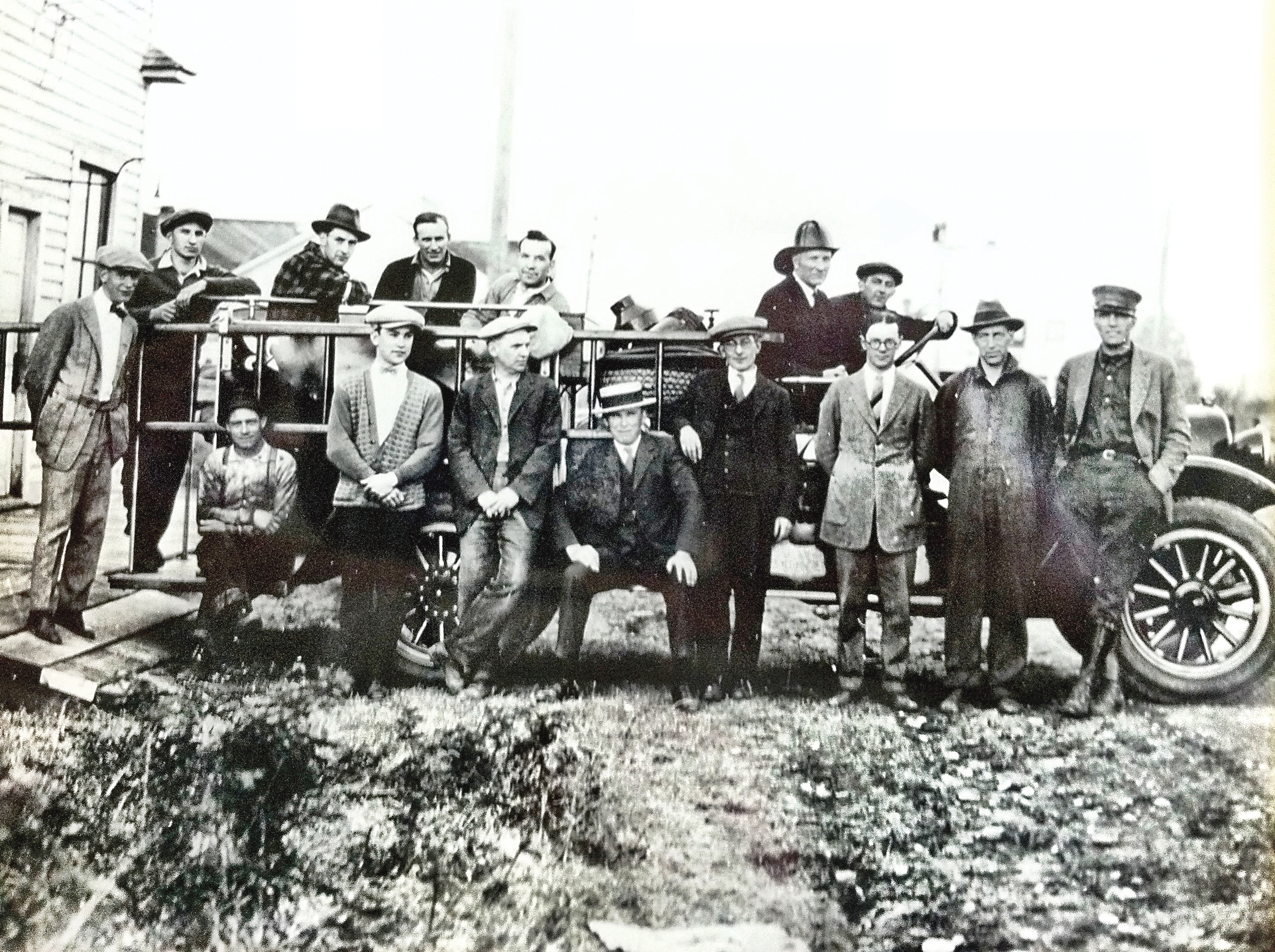 Sequim volunteer firefighters and city officials pose in 1925 with the used truck the town purchased for $250