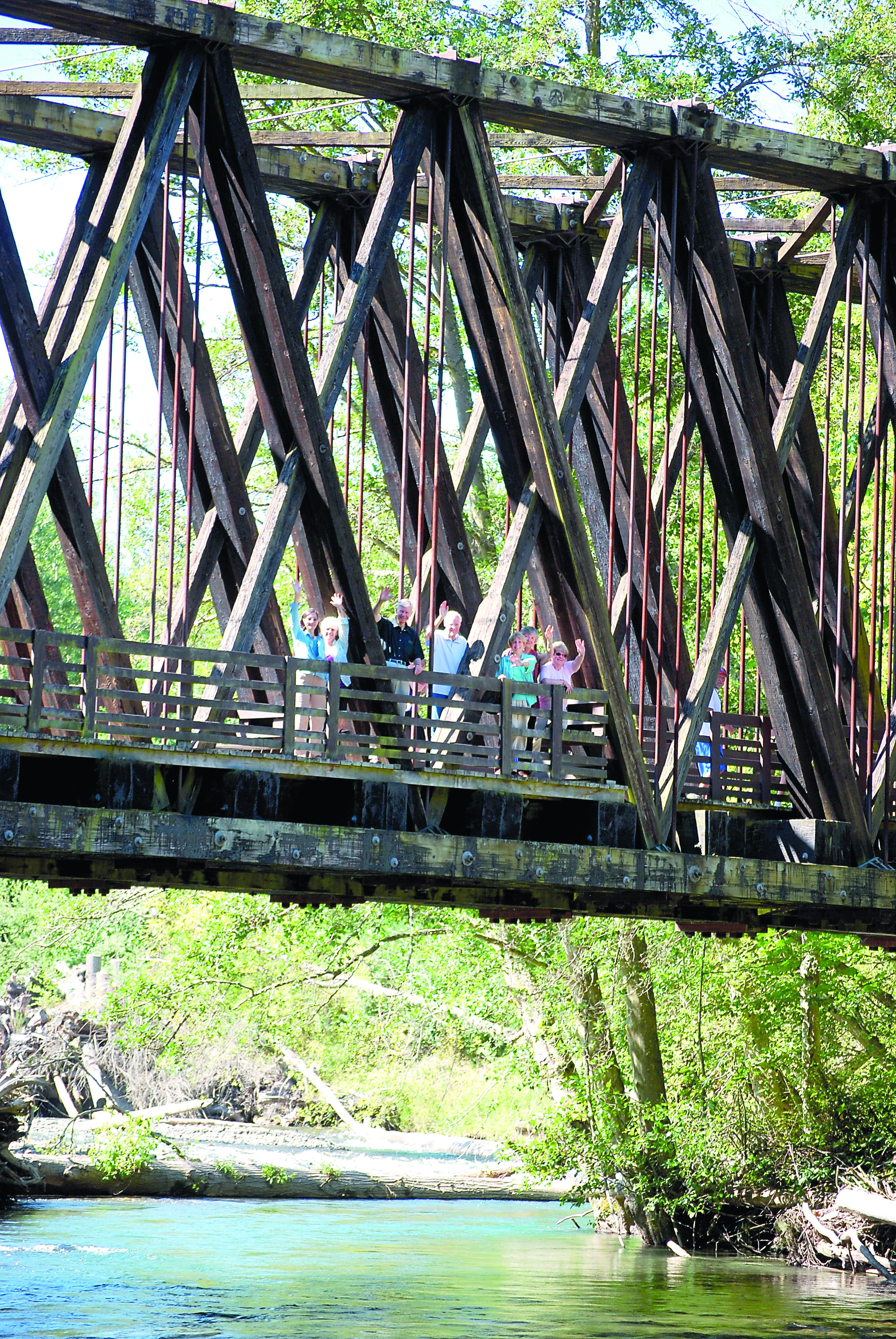 Waving from the Railroad Bridge Park trestle over the Dungeness River are