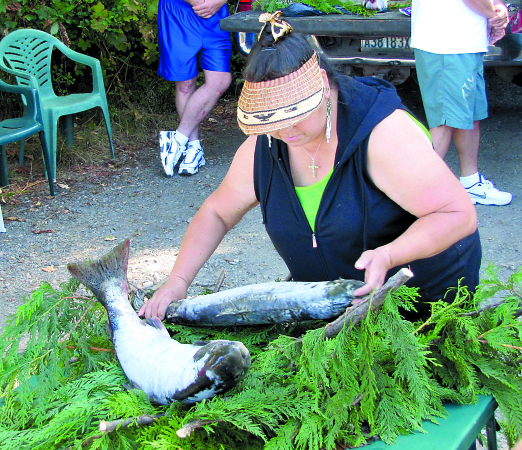 Lower Elwha Klallam tribe ceremoniously salmon back into