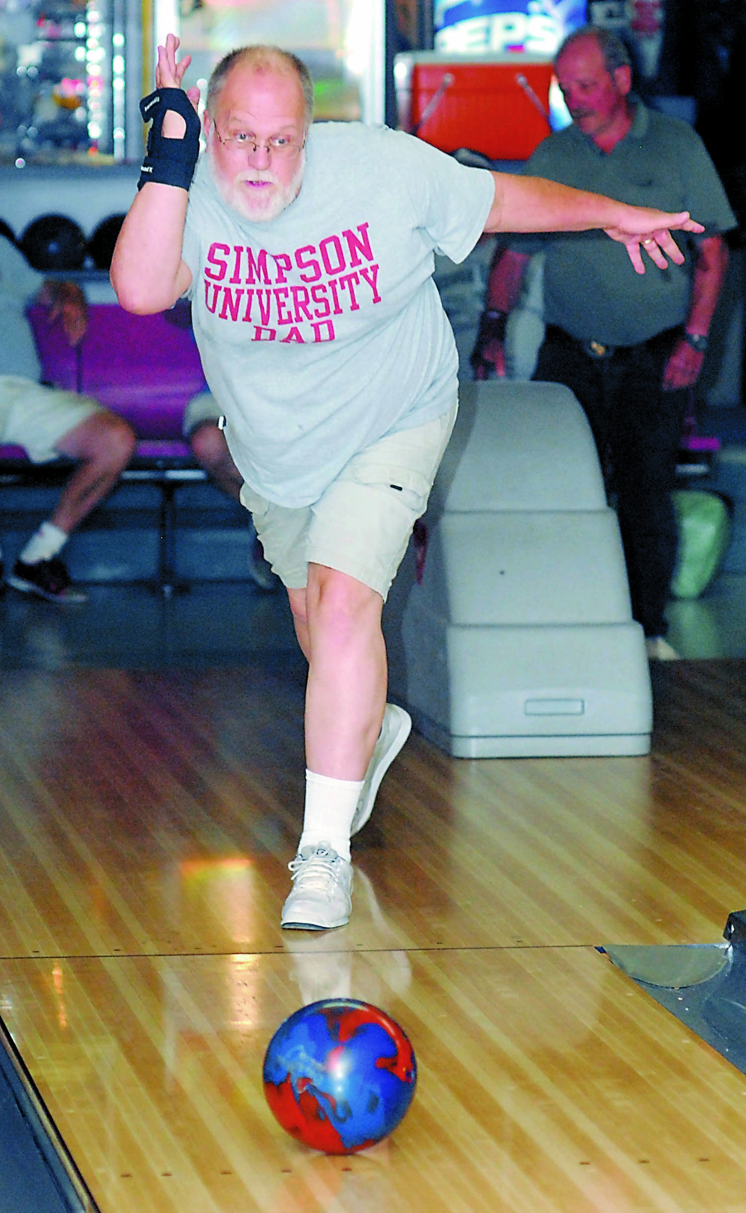Clifford Silliman of Sequim warms up for the bowling competition at Laurel Lanes in Port Angeles during last year's Senior Games.  -- Photo by Keith Thorpe/Peninsula Daily News