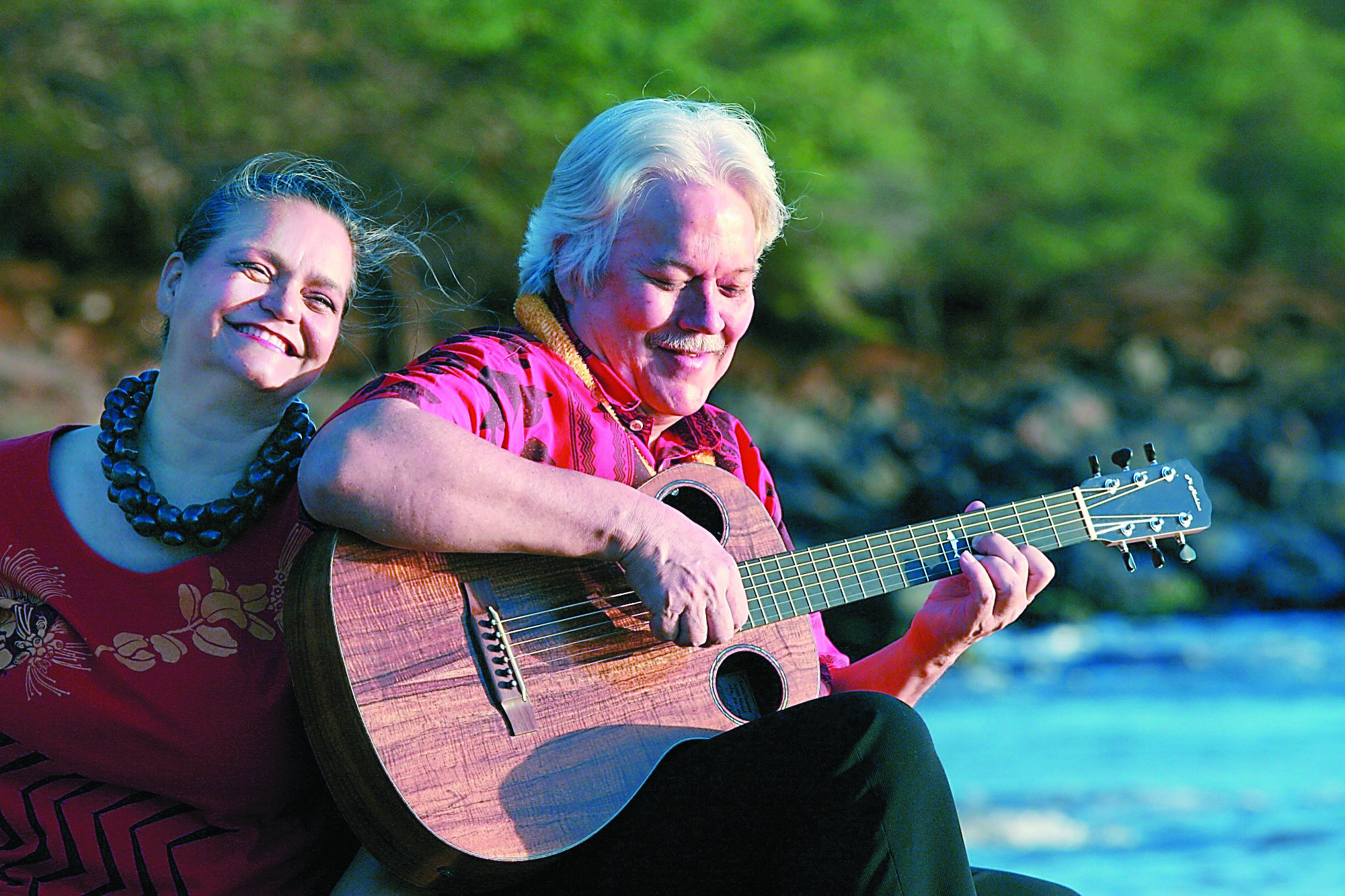 Hawaiian slack-key guitarist Keola Beamer and his wife