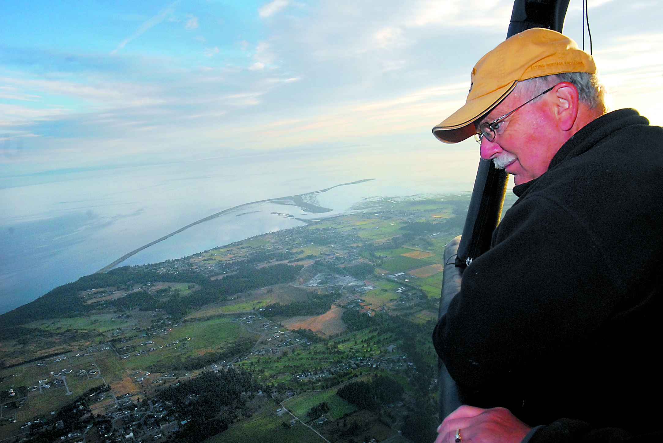 Willie Van Nostrand of Sequim peers down on the Dungeness Valley from 3