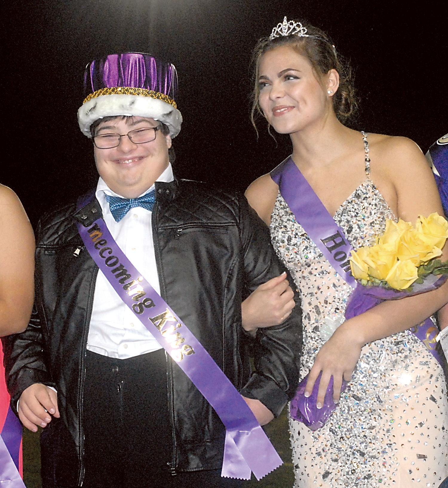 Sequim homecoming senior royalty King Nick Barrett and Queen Katie Rogers smile after their coronation at halftime of Friday night's game against Port Angeles. Keith Thorpe/Peninsula Daily News