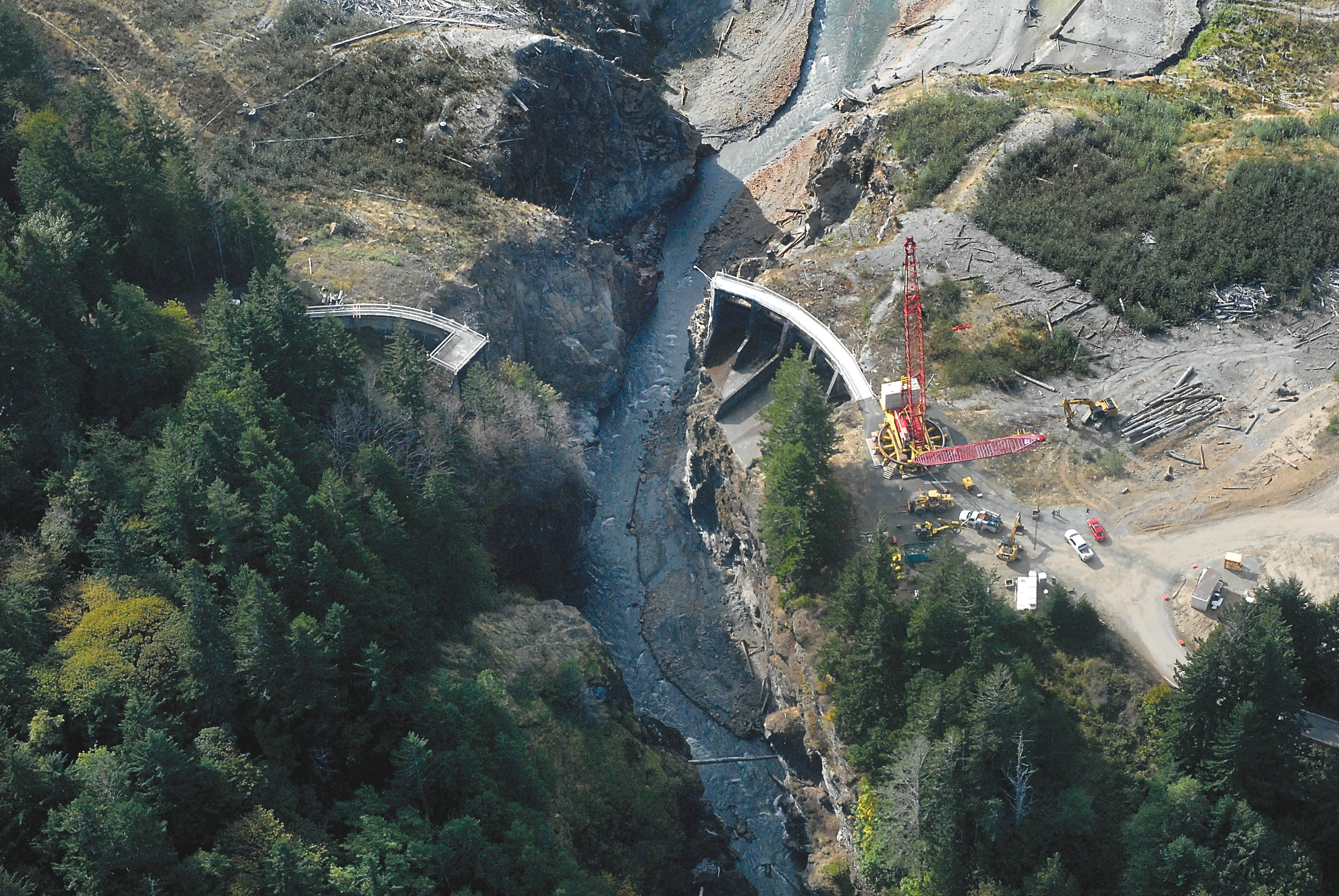 The Elwha River passes through what was once Glines Canyon Dam in this aerial photograph taken in Olympic National Park. Portions of the former dam
