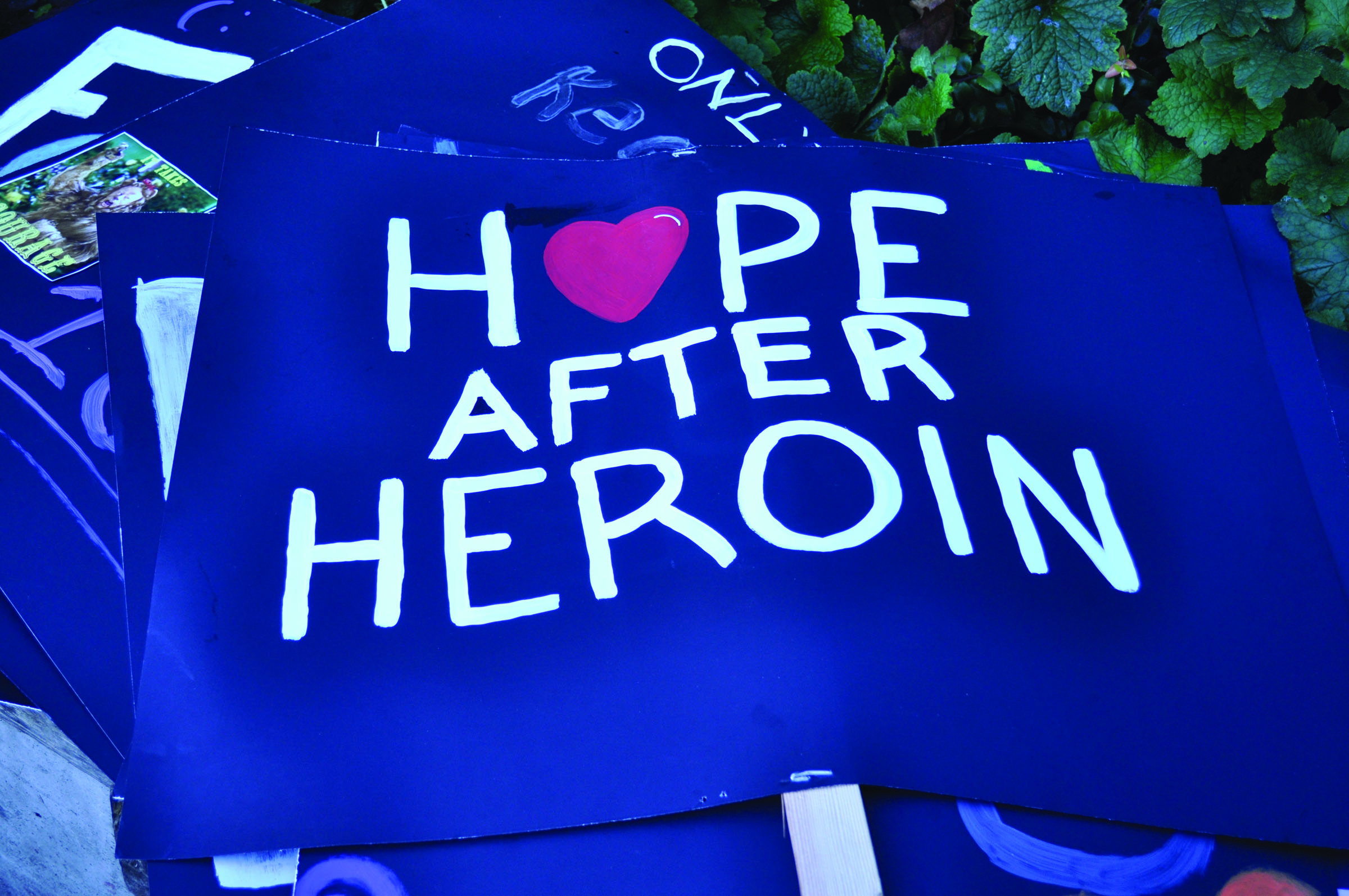 Members of the Hope after Heroin group in Port Angeles picked up syringes Friday at the Conrad Dyer Memorial Fountain