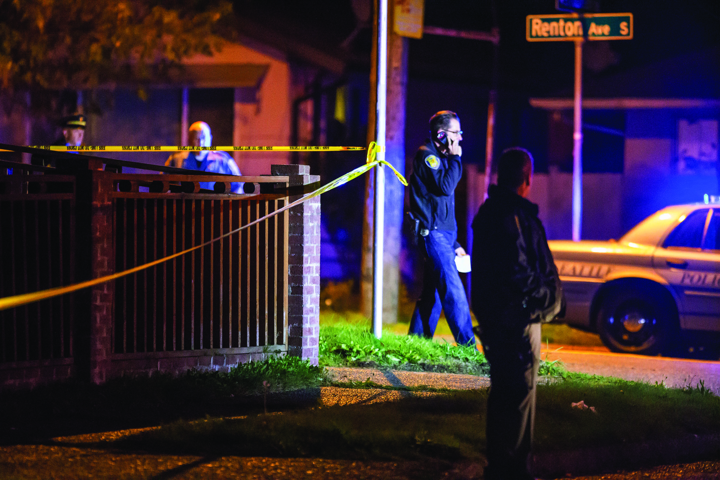 Police work the scene of a murder/suicide in south Seattle on Monday. — The Associated Press