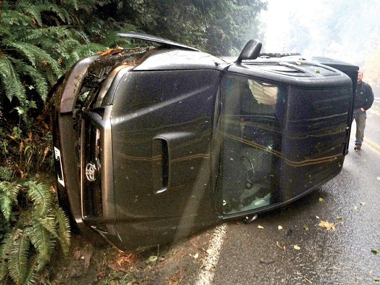 A driver was uninjured after his truck rolled over on Black Diamond Road early Tuesday. Clallam County Fire District No. 2
