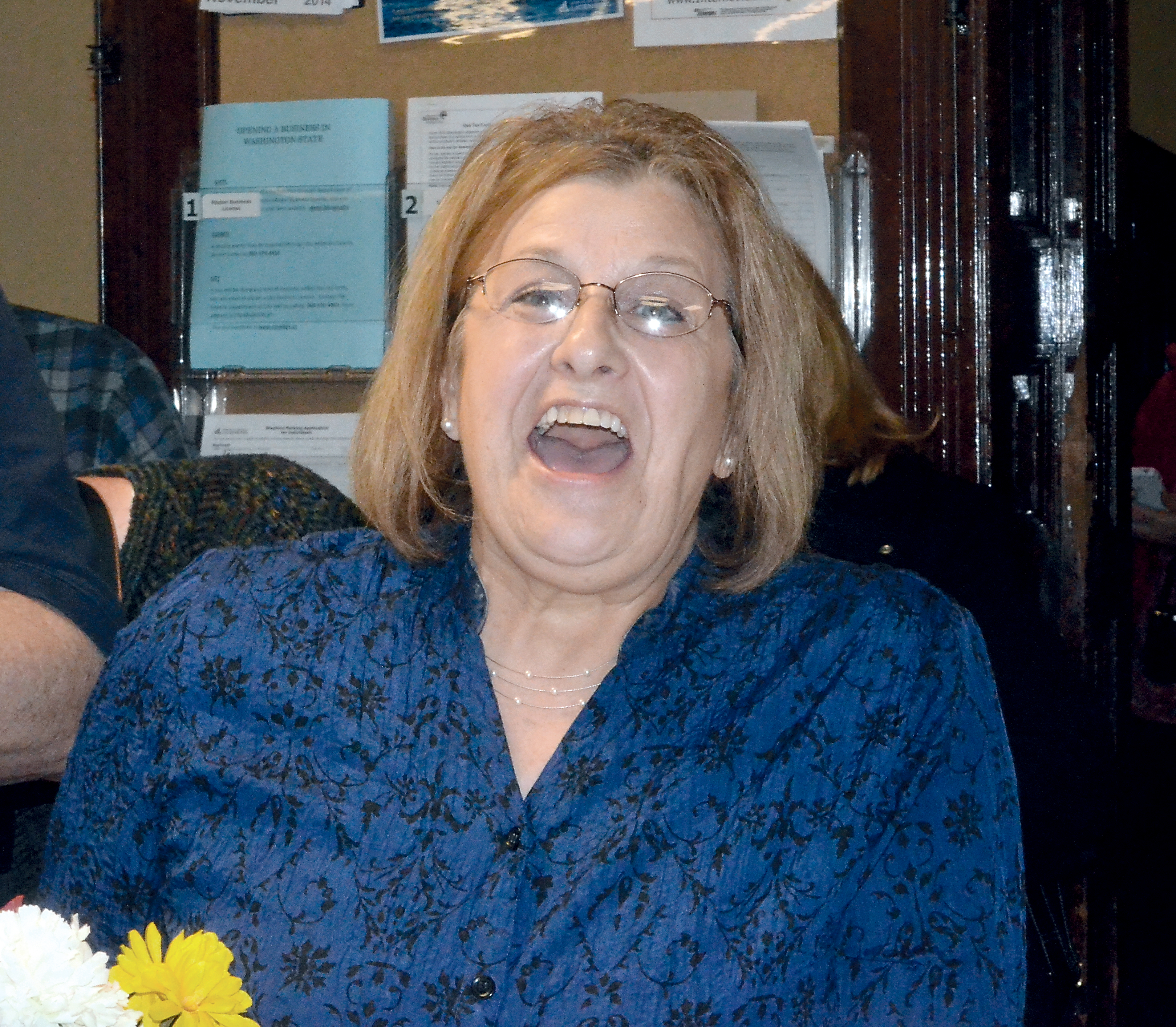 Rose Ann Carroll shows delight after seeing Tuesday night's election returns at the Jefferson County Courthouse. Charlie Bermant/Peninsula Daily News