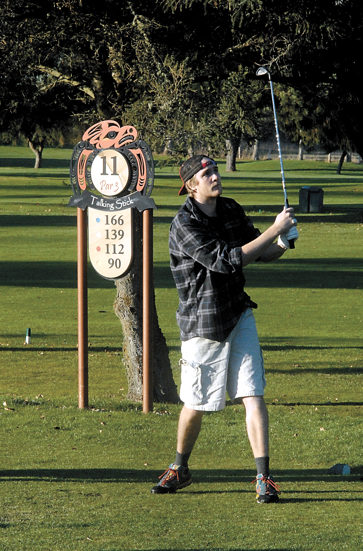 Jacob Haynes of Issaquah tees off on the 11th hole at The Cedars at Dungeness golf course near Sequim. — Keith Thorpe/Peninsula Daily News